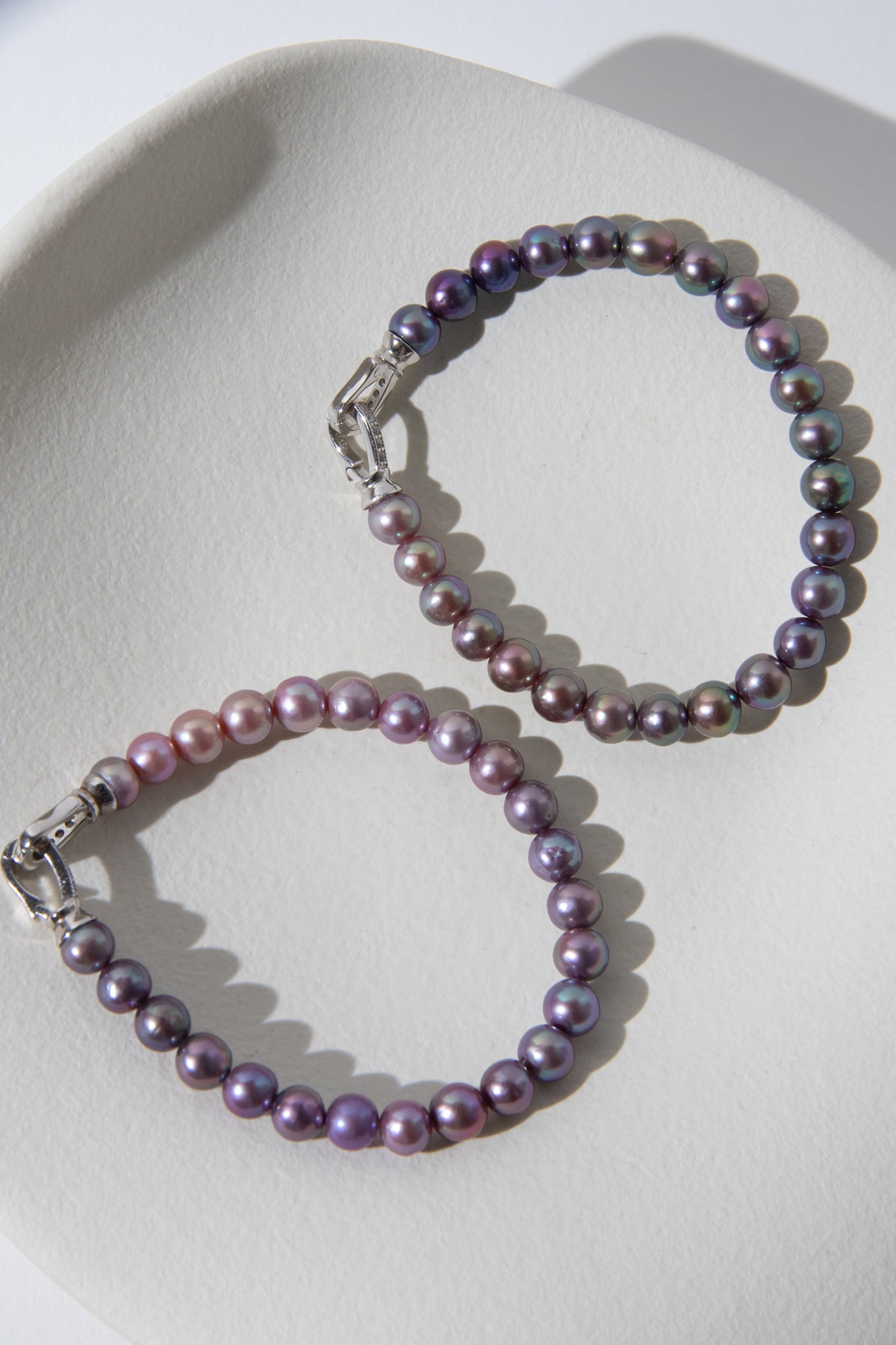Purple rainbow round pearl bracelets.