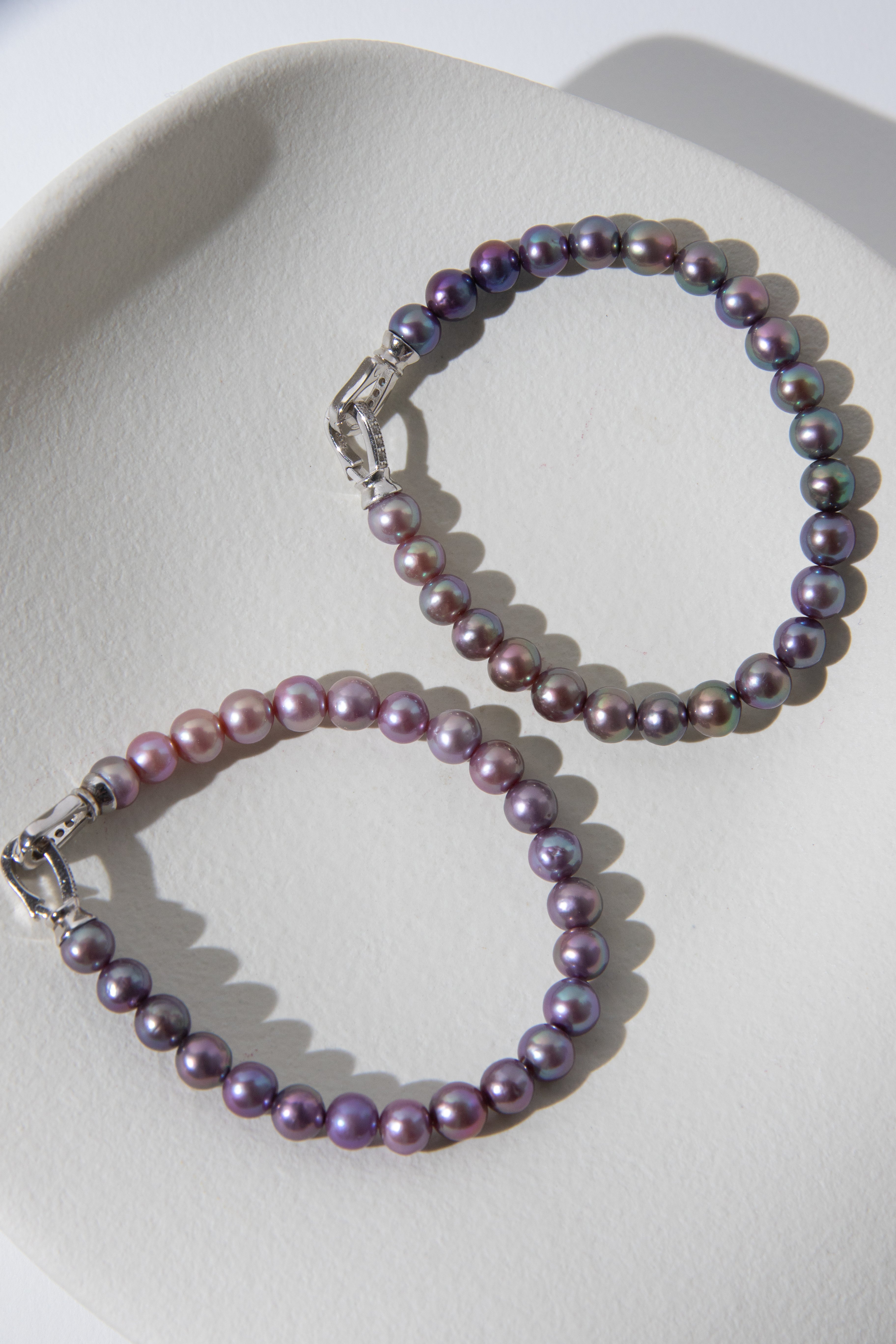 Purple rainbow round pearl bracelets.