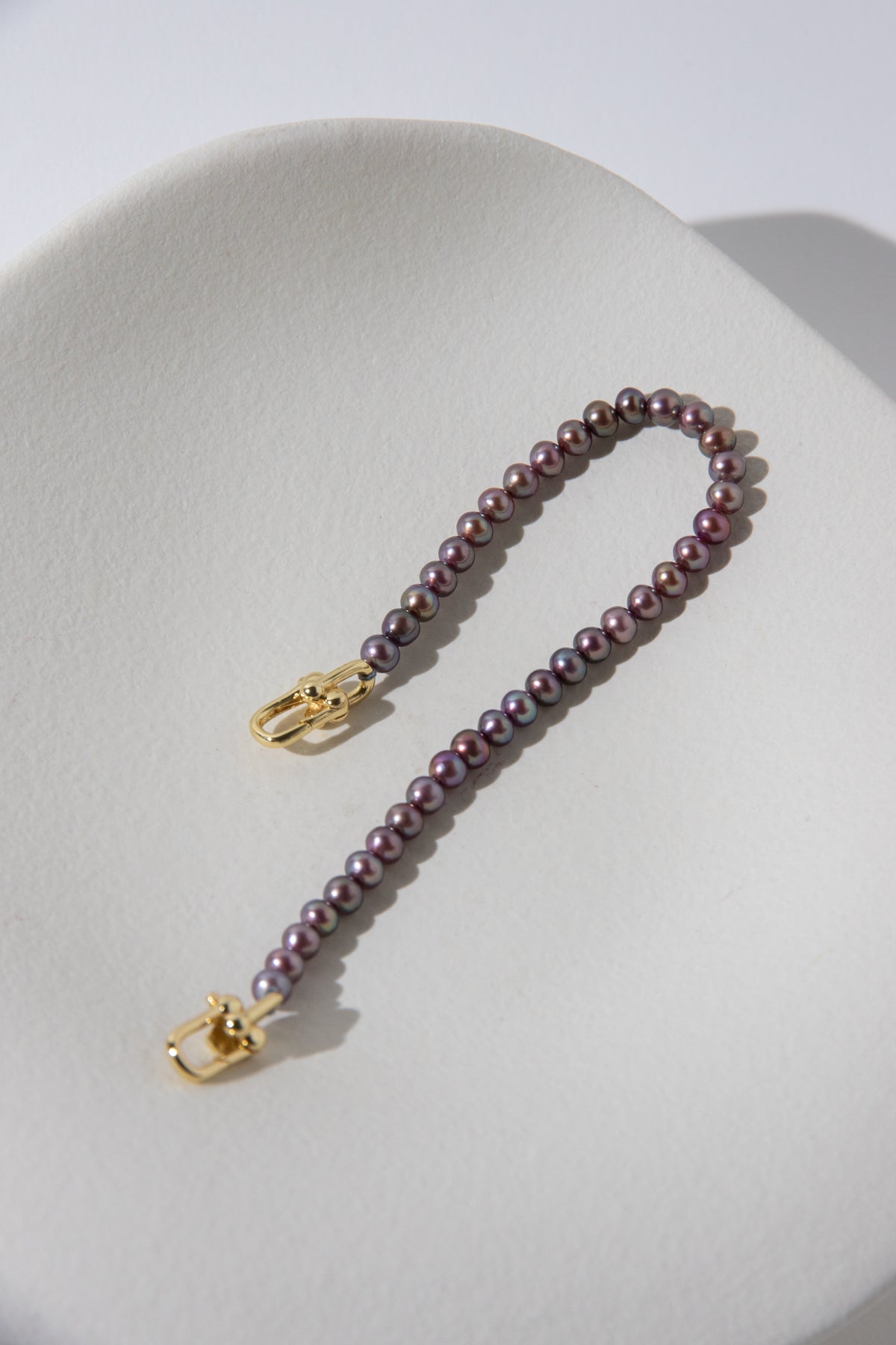 small brown purple color seedless round pearls bracelet