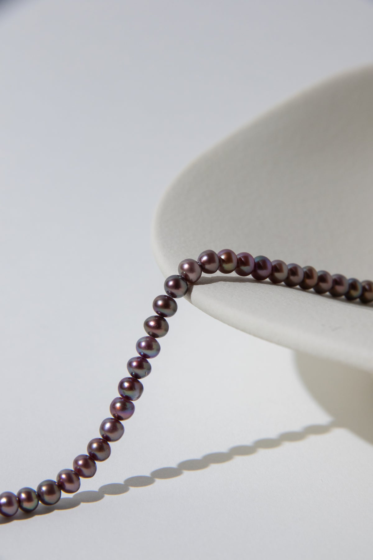 small brown purple color seedless round pearls bracelet