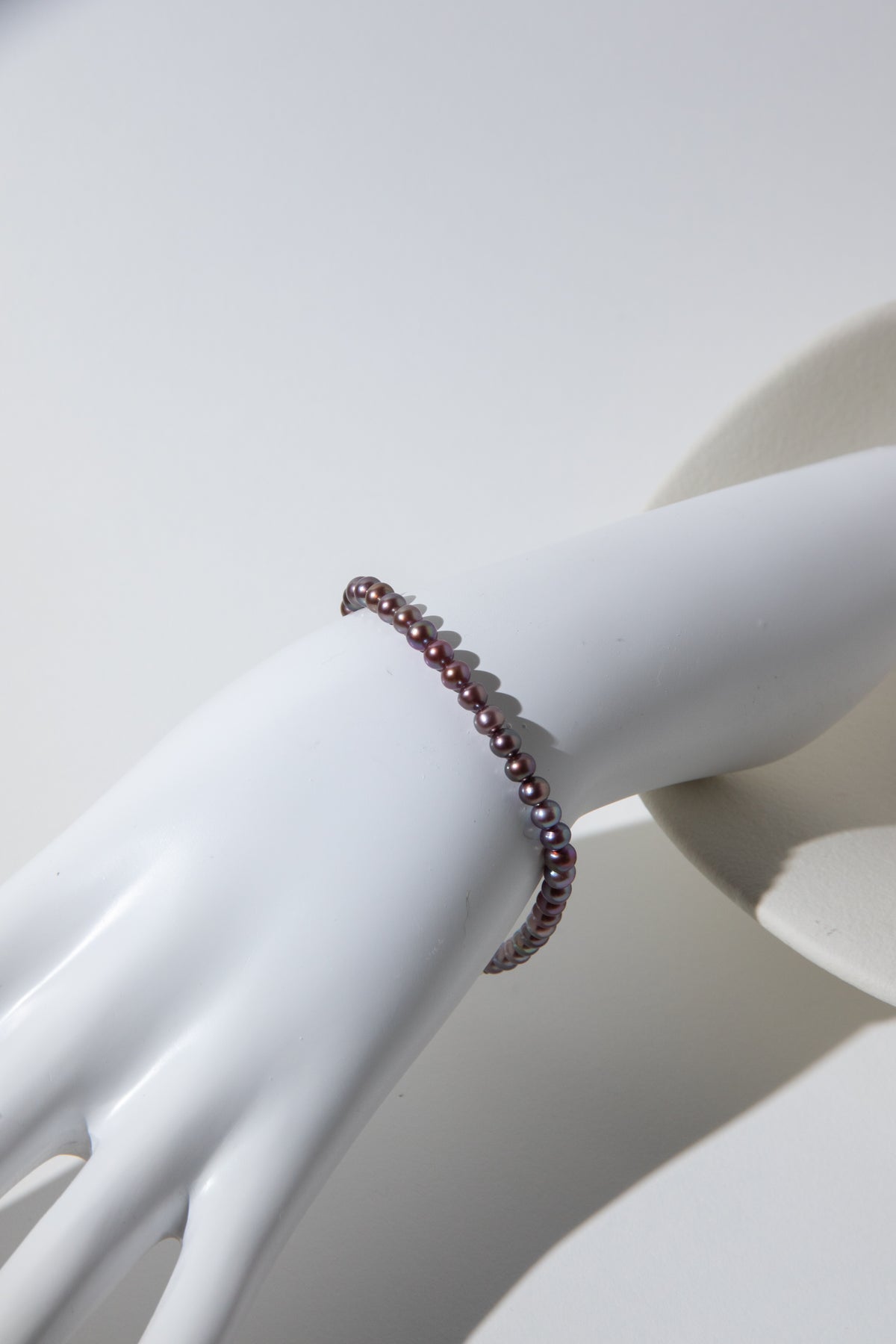 small brown purple color seedless round pearls bracelet