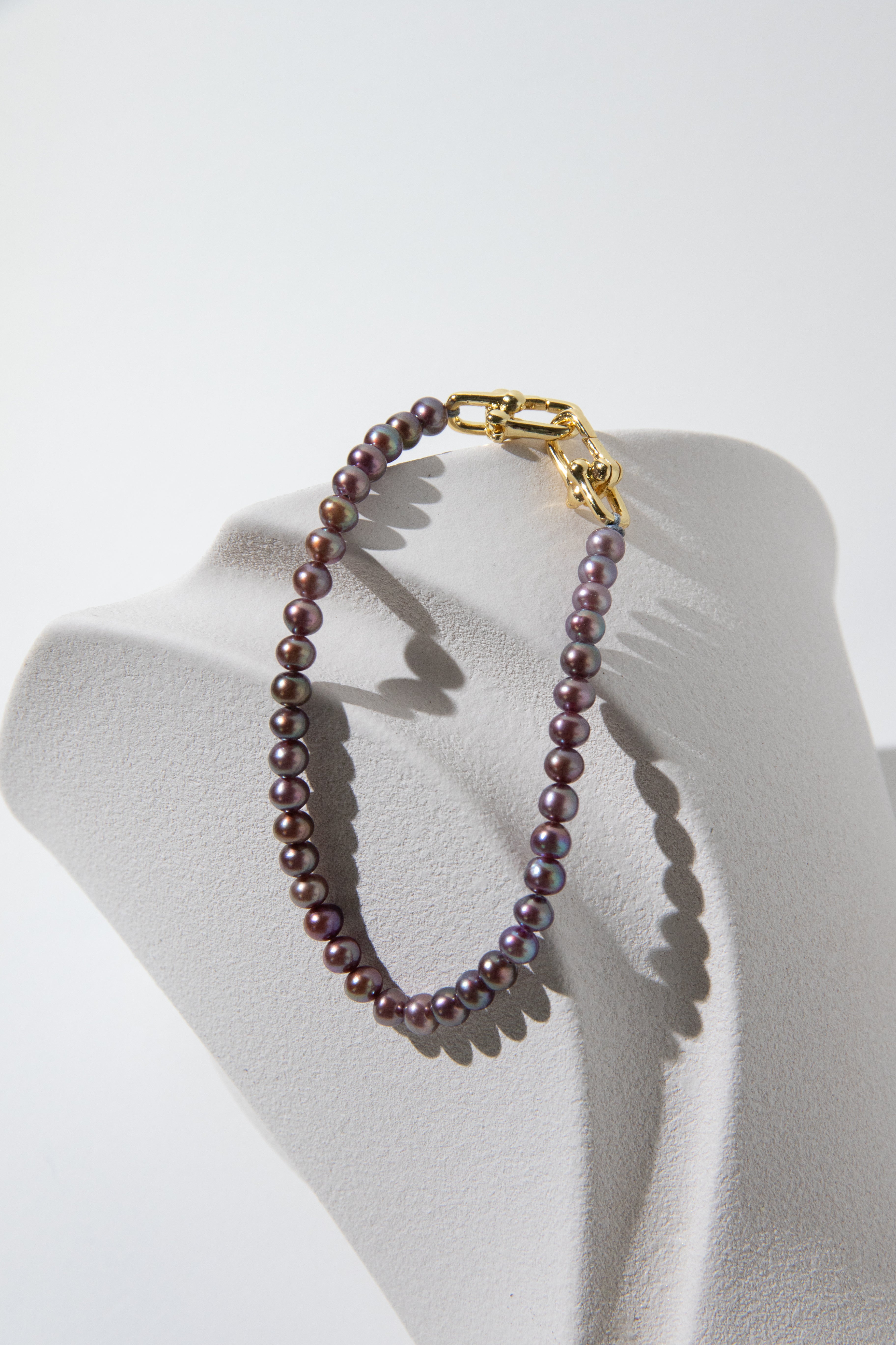 small brown purple color seedless round pearls bracelet