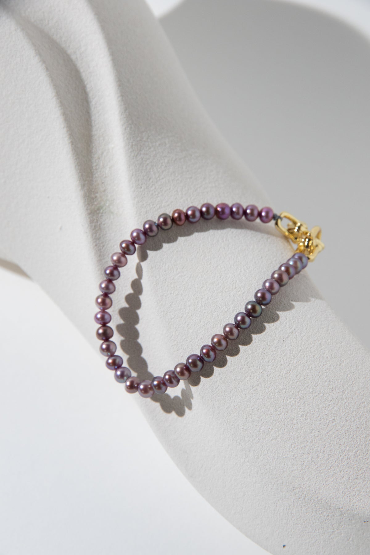 small brown purple color seedless round pearls bracelet