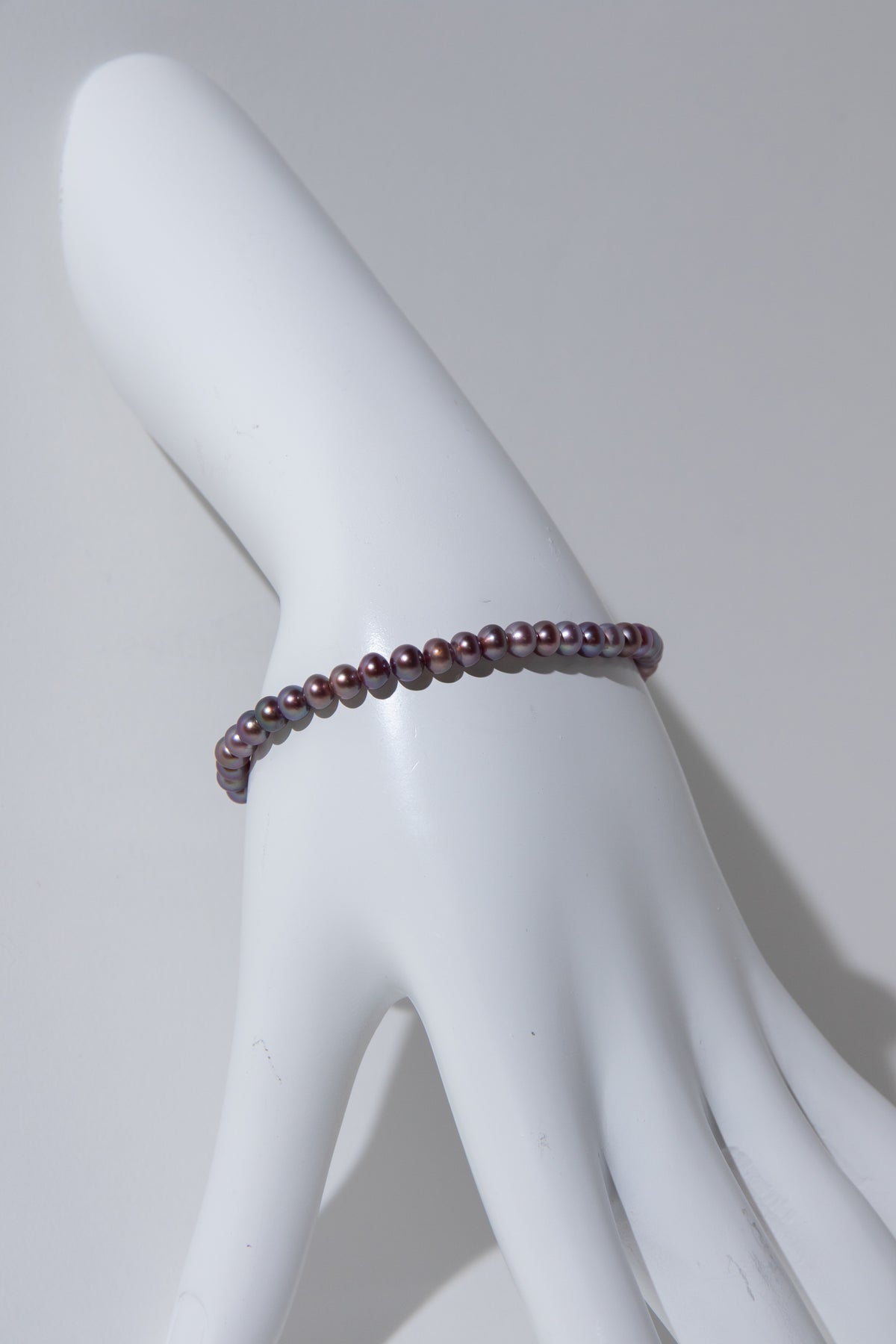 small brown purple color seedless round pearls bracelet