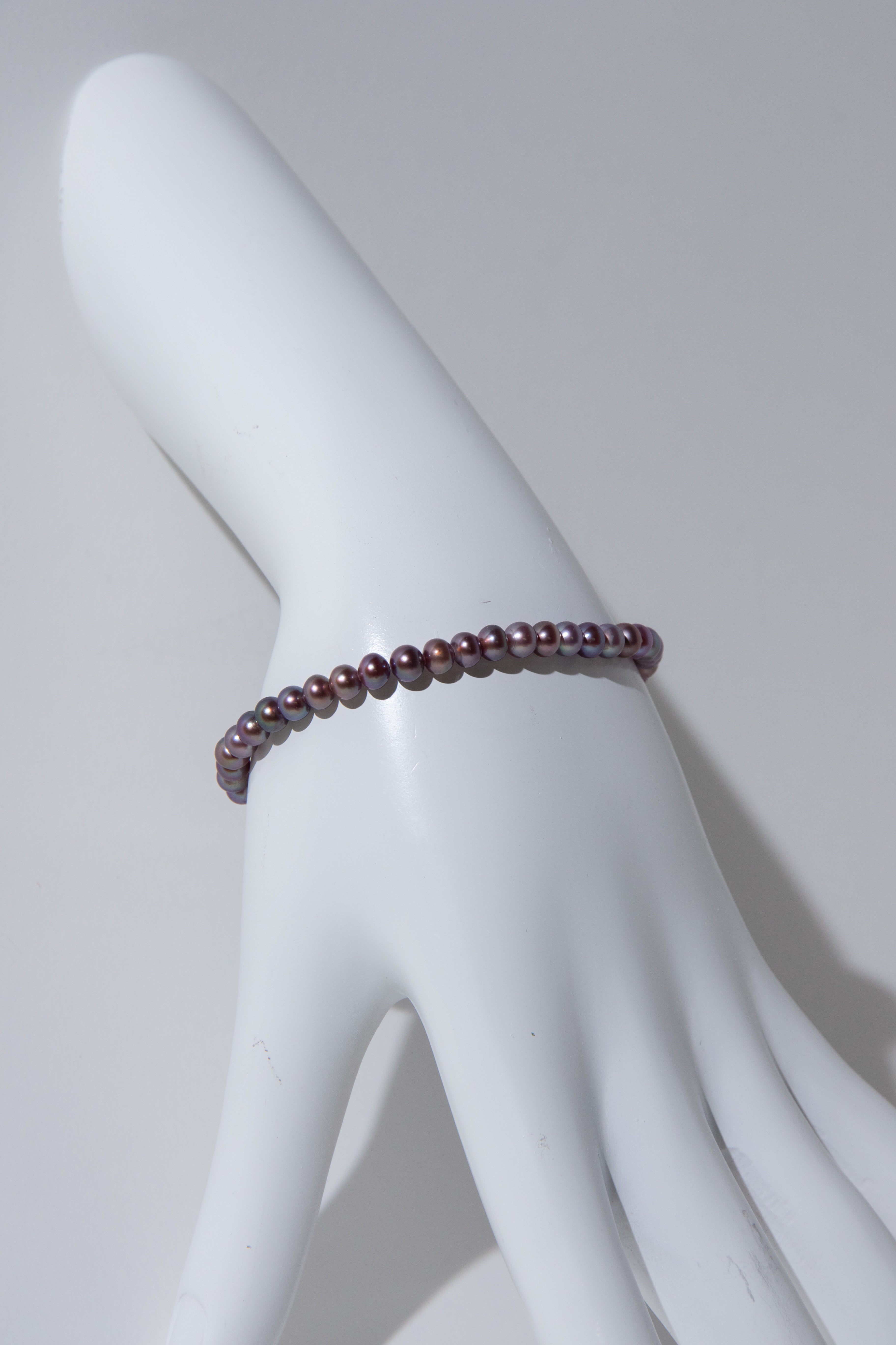 small brown purple color seedless round pearls bracelet