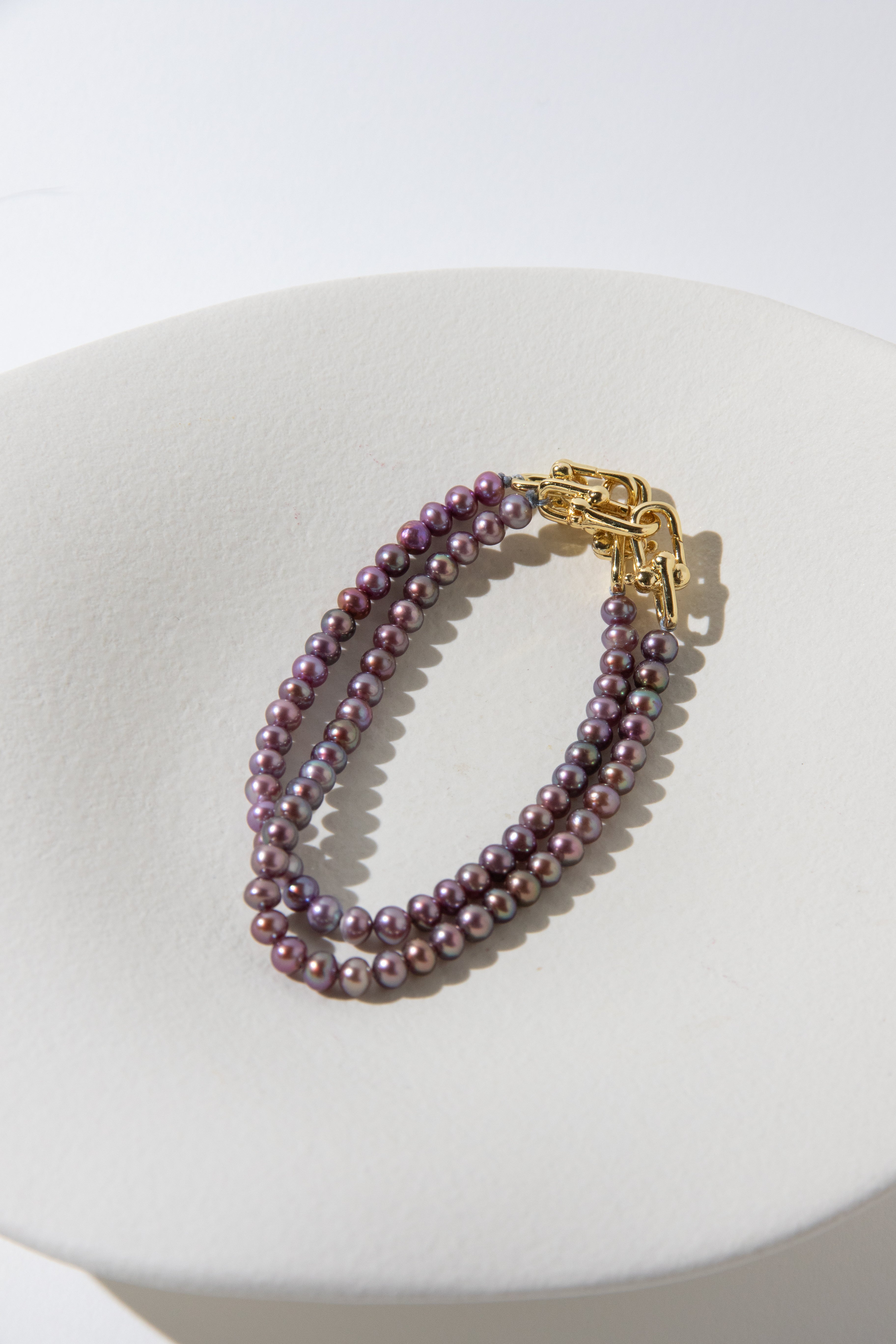 small brown purple color seedless round pearls bracelet