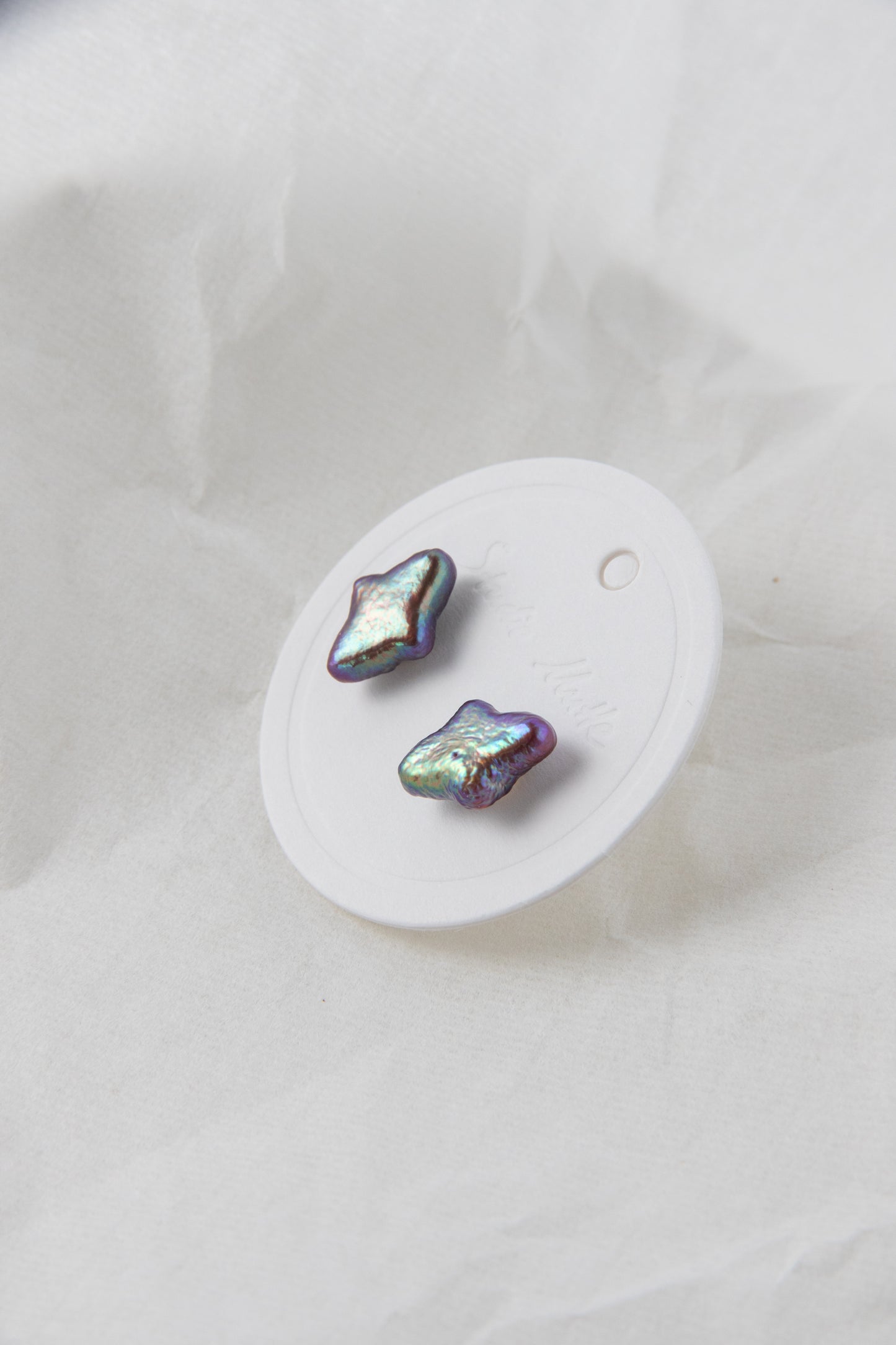Polar star shaped vivid aurora purple colored pearl studs-NR.1