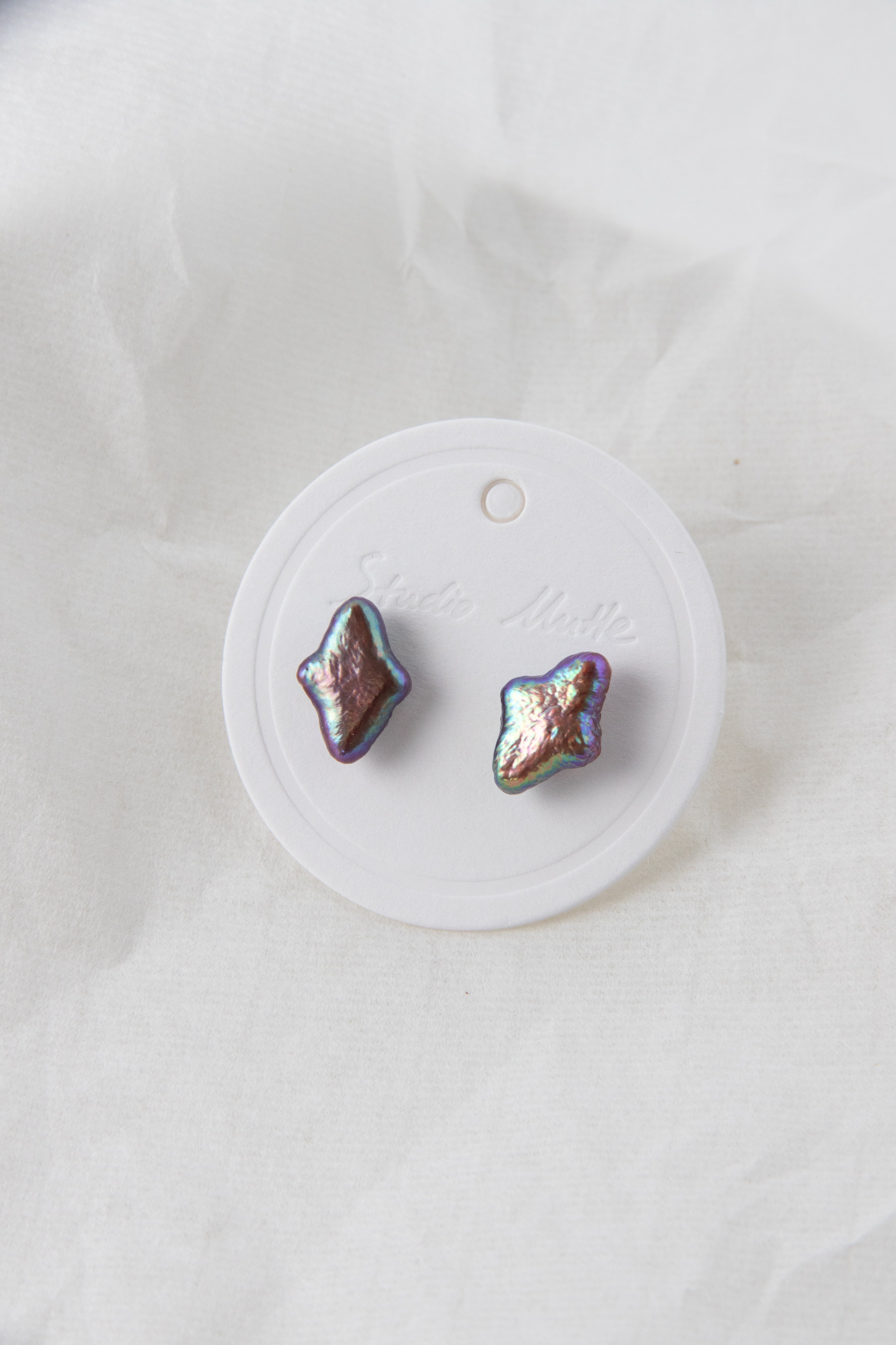 Polar star shaped vivid aurora purple colored pearl studs-NR.1