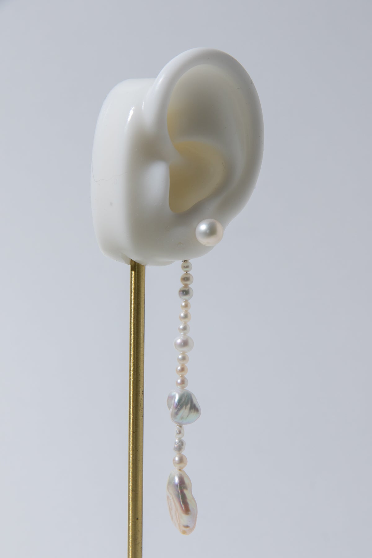 Long Irregular white pearls Jacket structure earring.