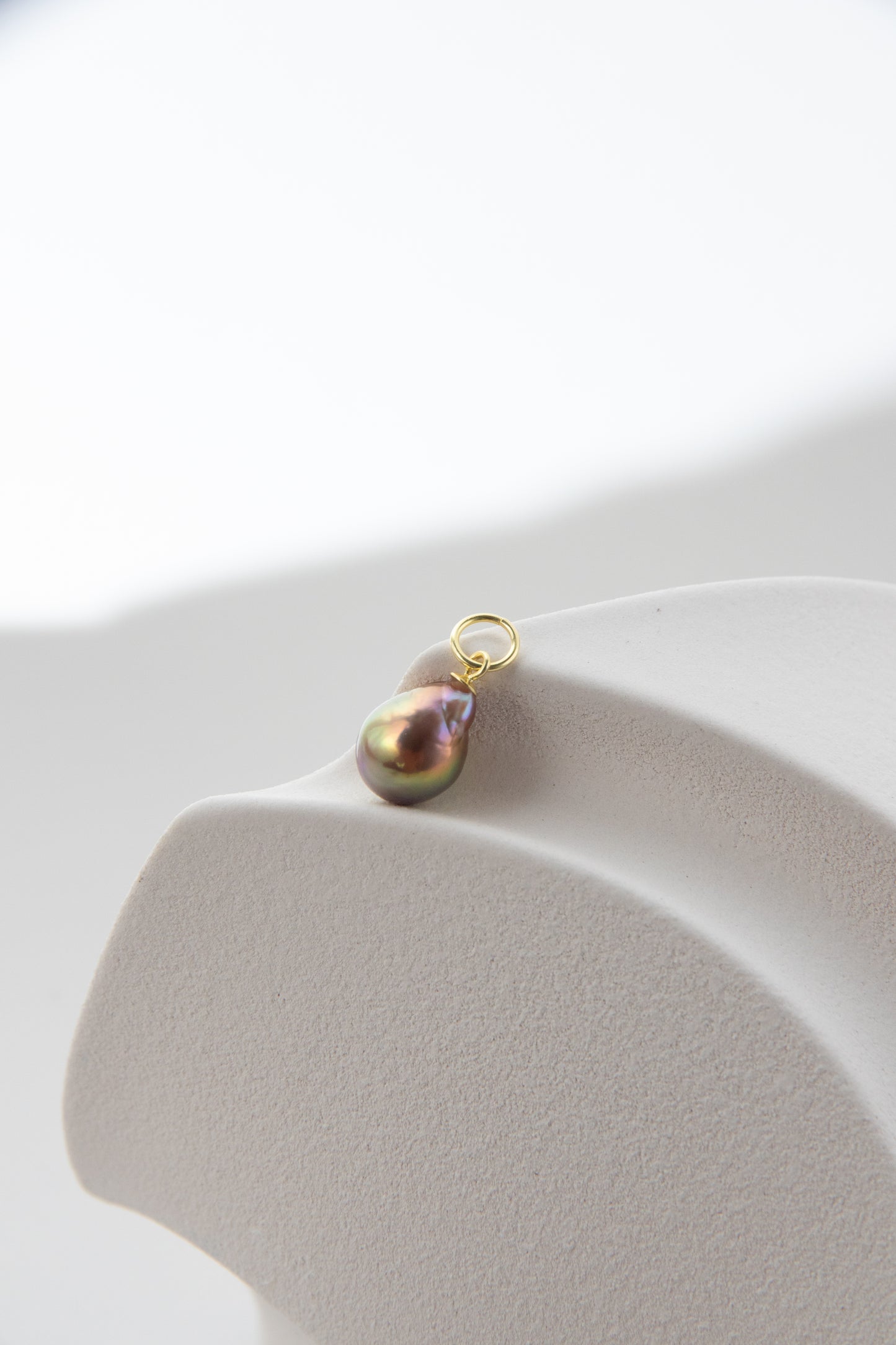 Small shiny metallic avocado pearl pendant