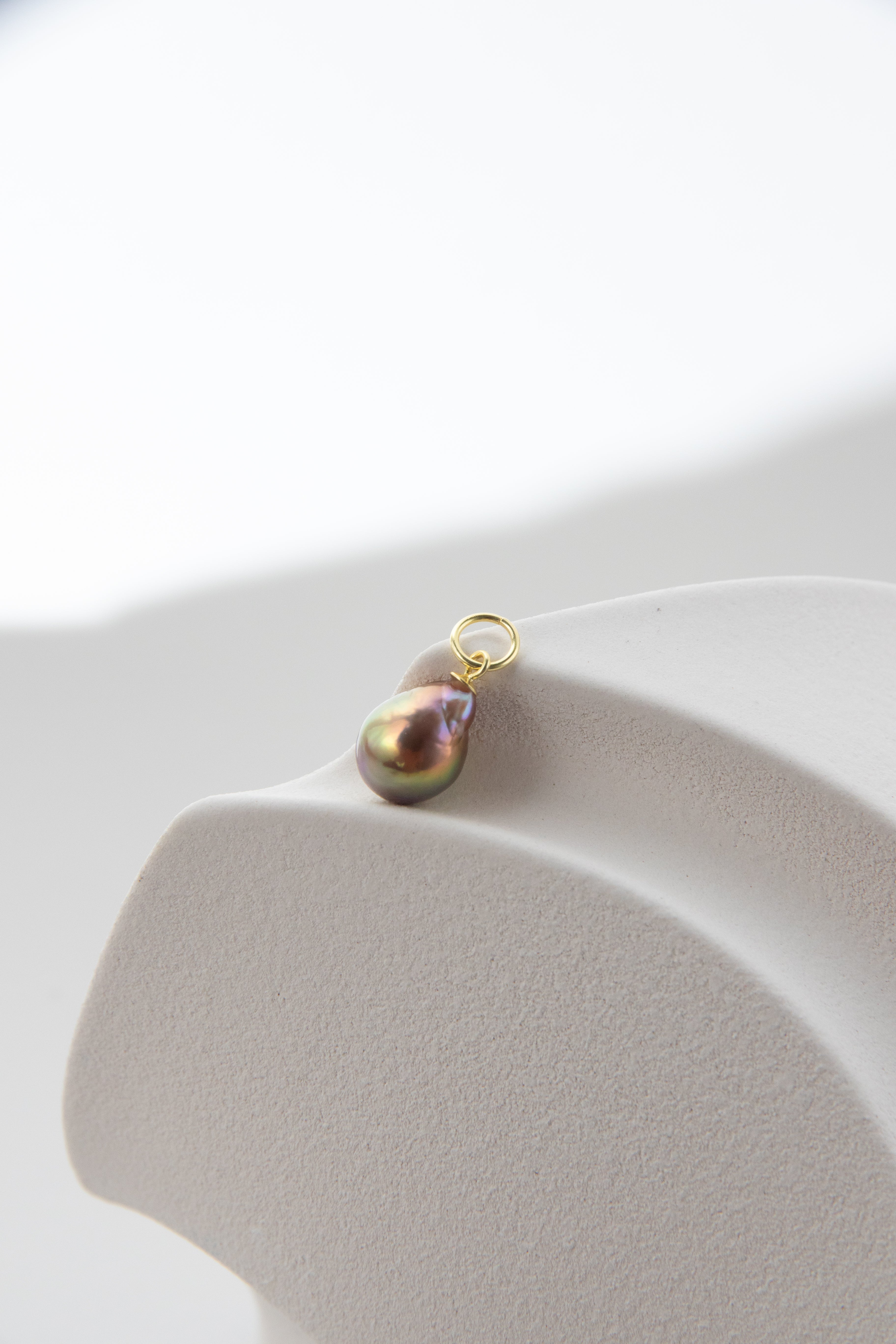 Small shiny metallic avocado pearl pendant