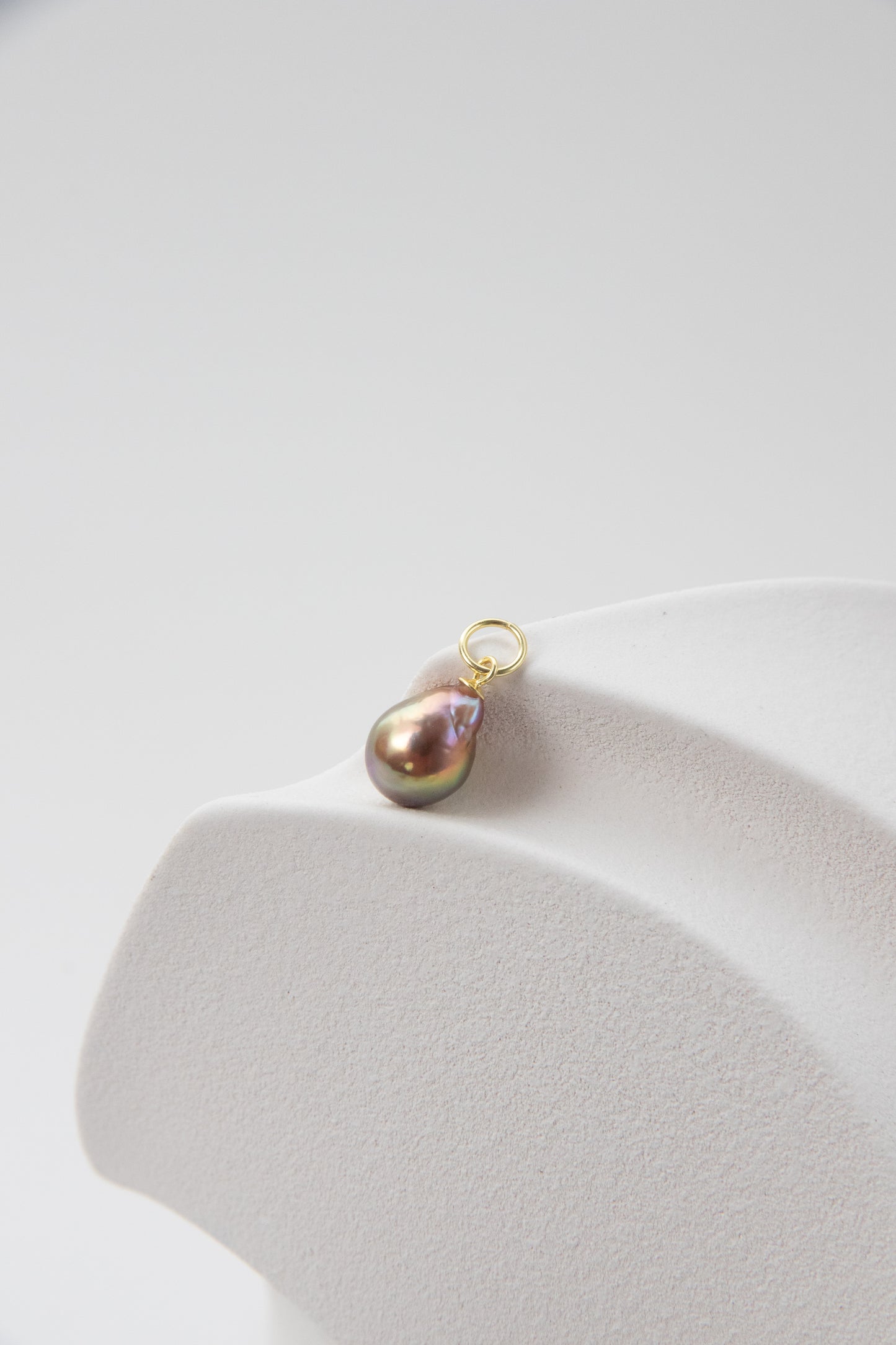Small shiny metallic avocado pearl pendant