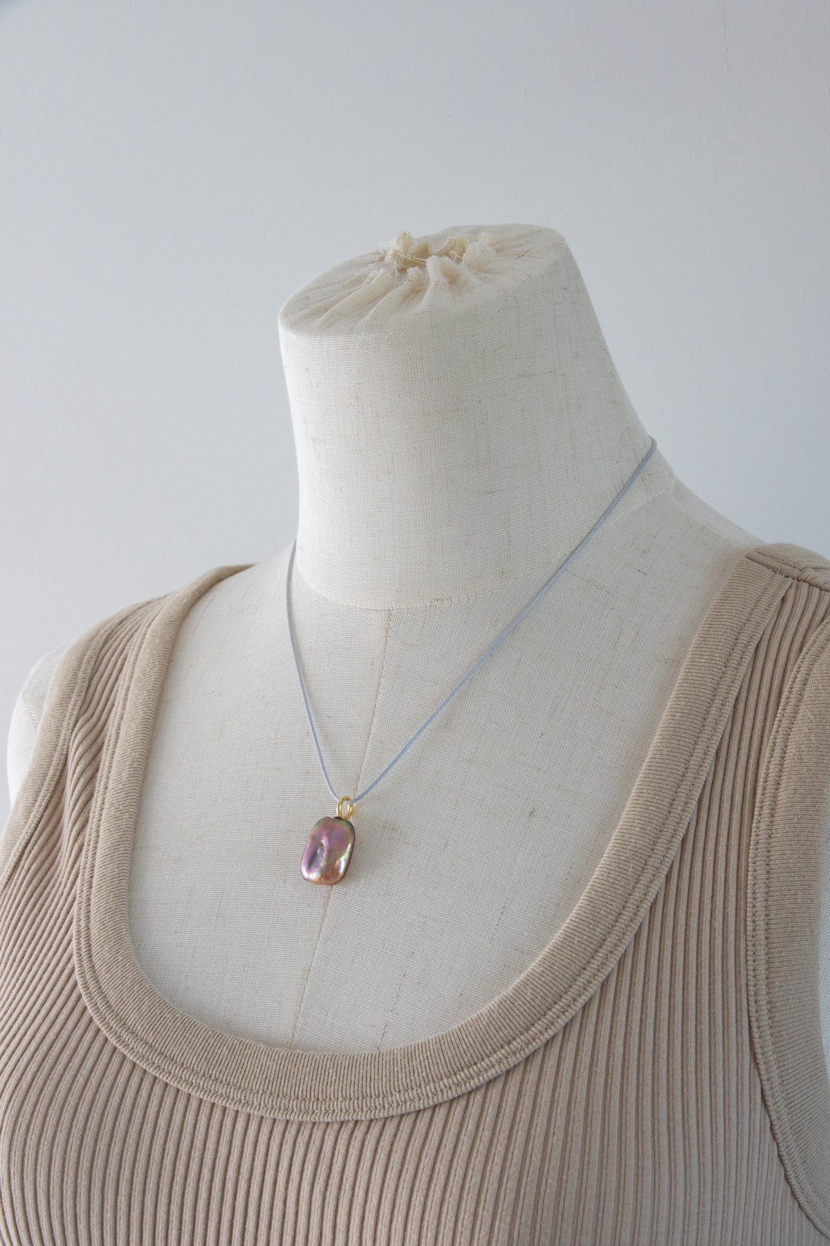 Strong thick brown based vivid green and purple square pearl pendant.