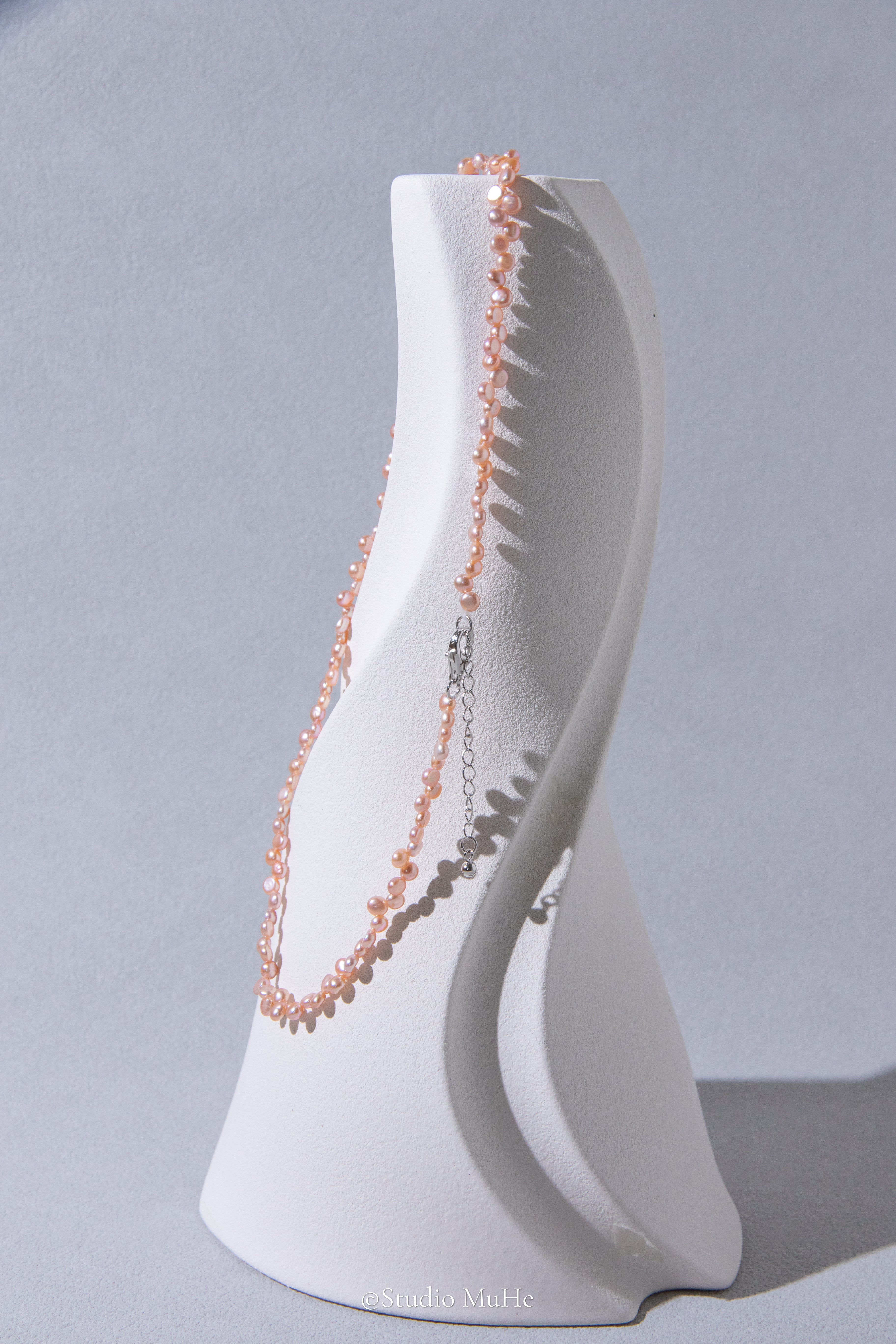 Floral peach- mini seedless flat round peach toned pink pearl necklace