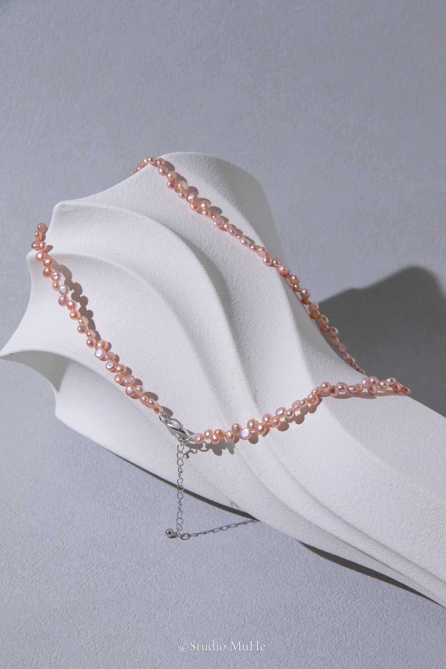 Floral peach- mini seedless flat round peach toned pink pearl necklace