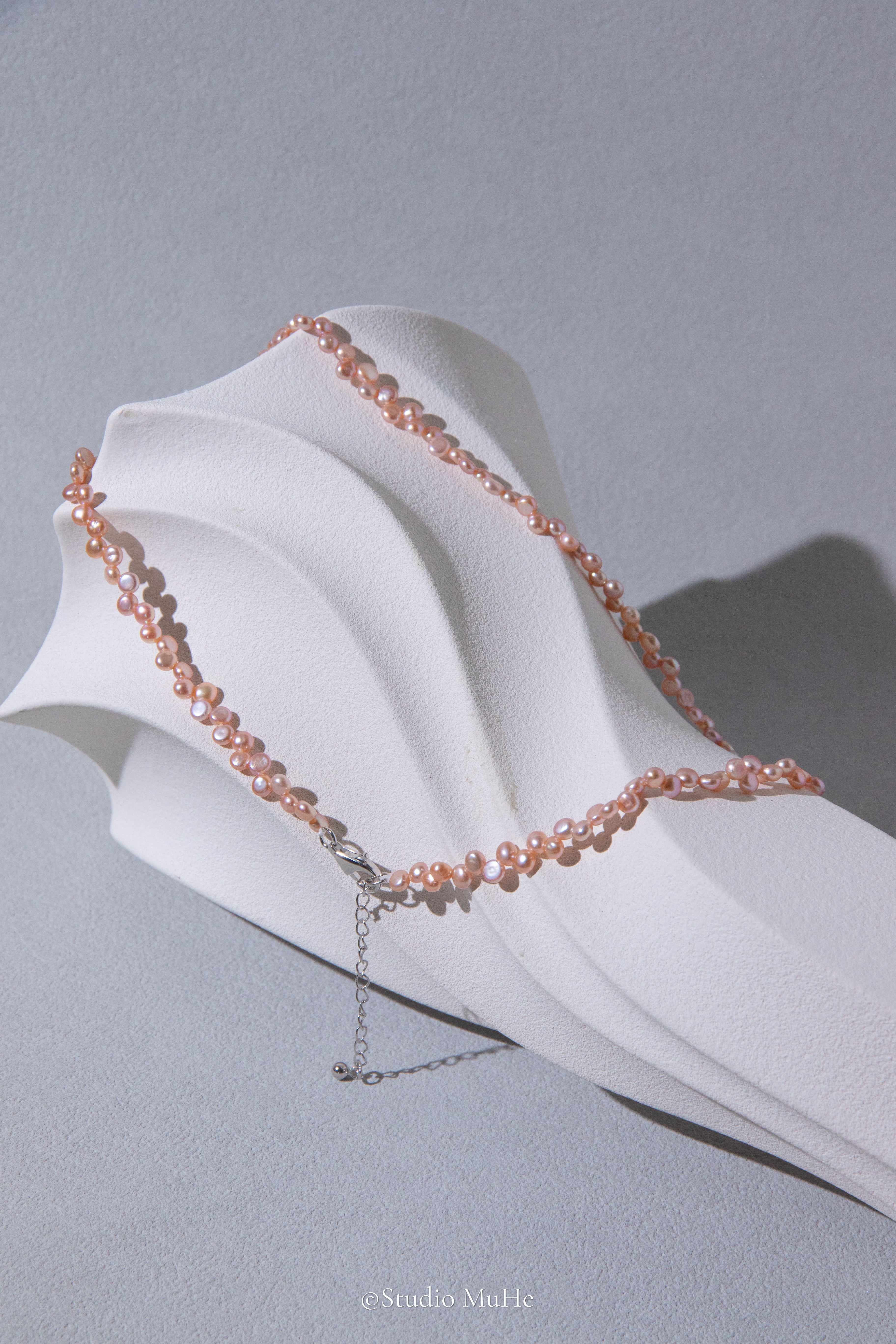 Floral peach- mini seedless flat round peach toned pink pearl necklace