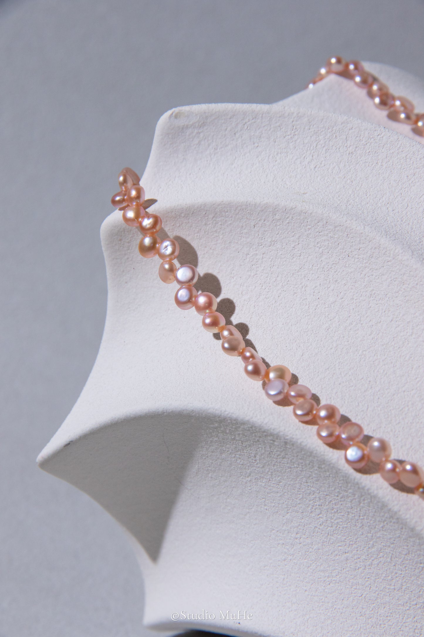 Floral peach- mini seedless flat round peach toned pink pearl necklace