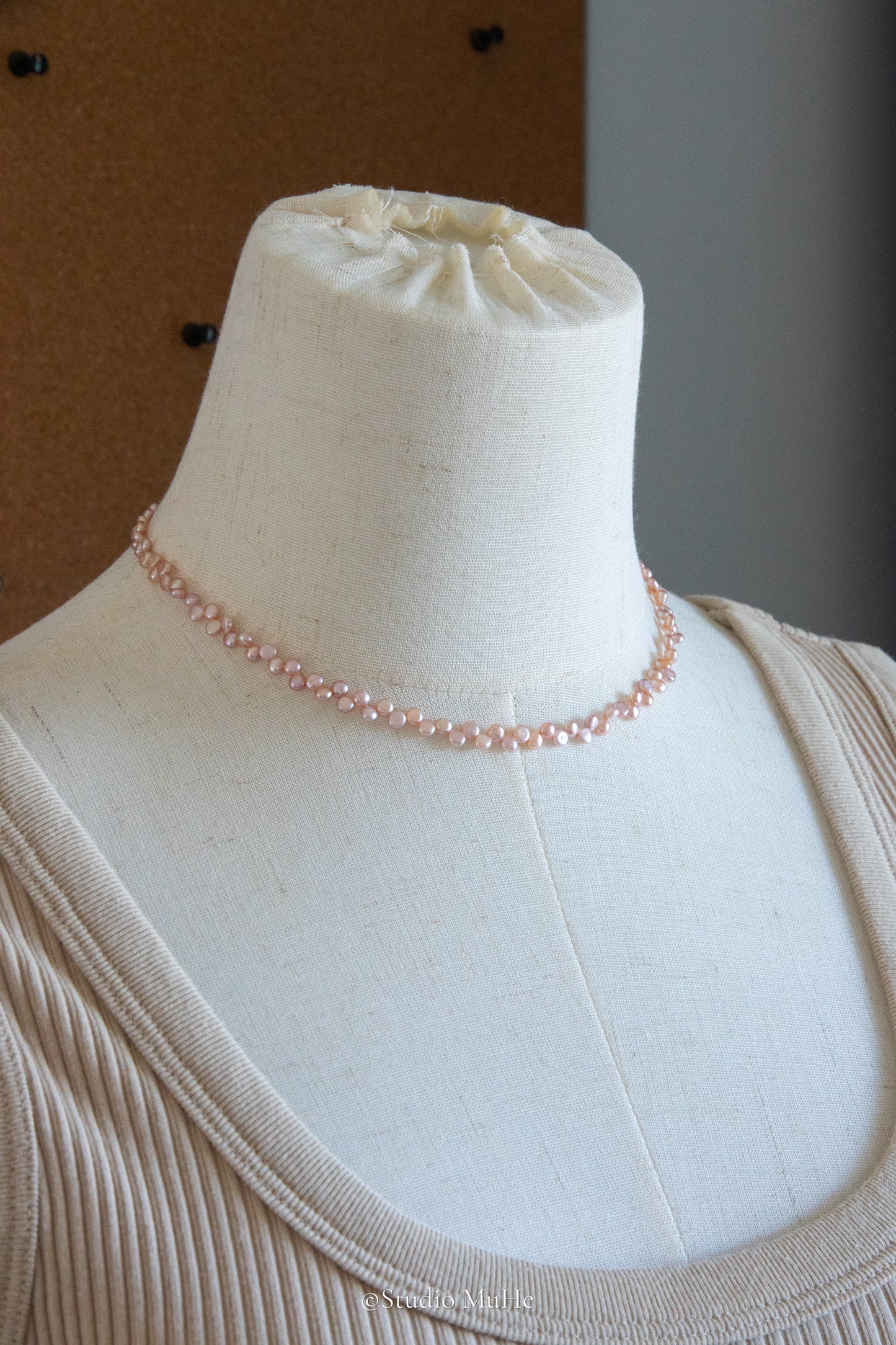Floral peach- mini seedless flat round peach toned pink pearl necklace