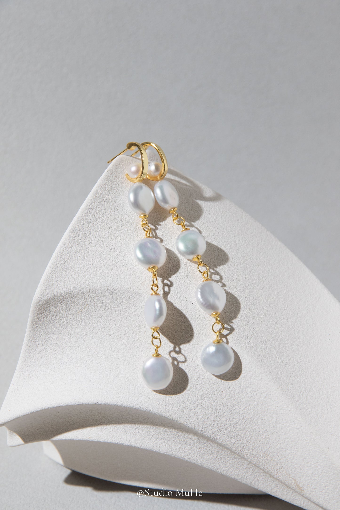 White button pearl earrings