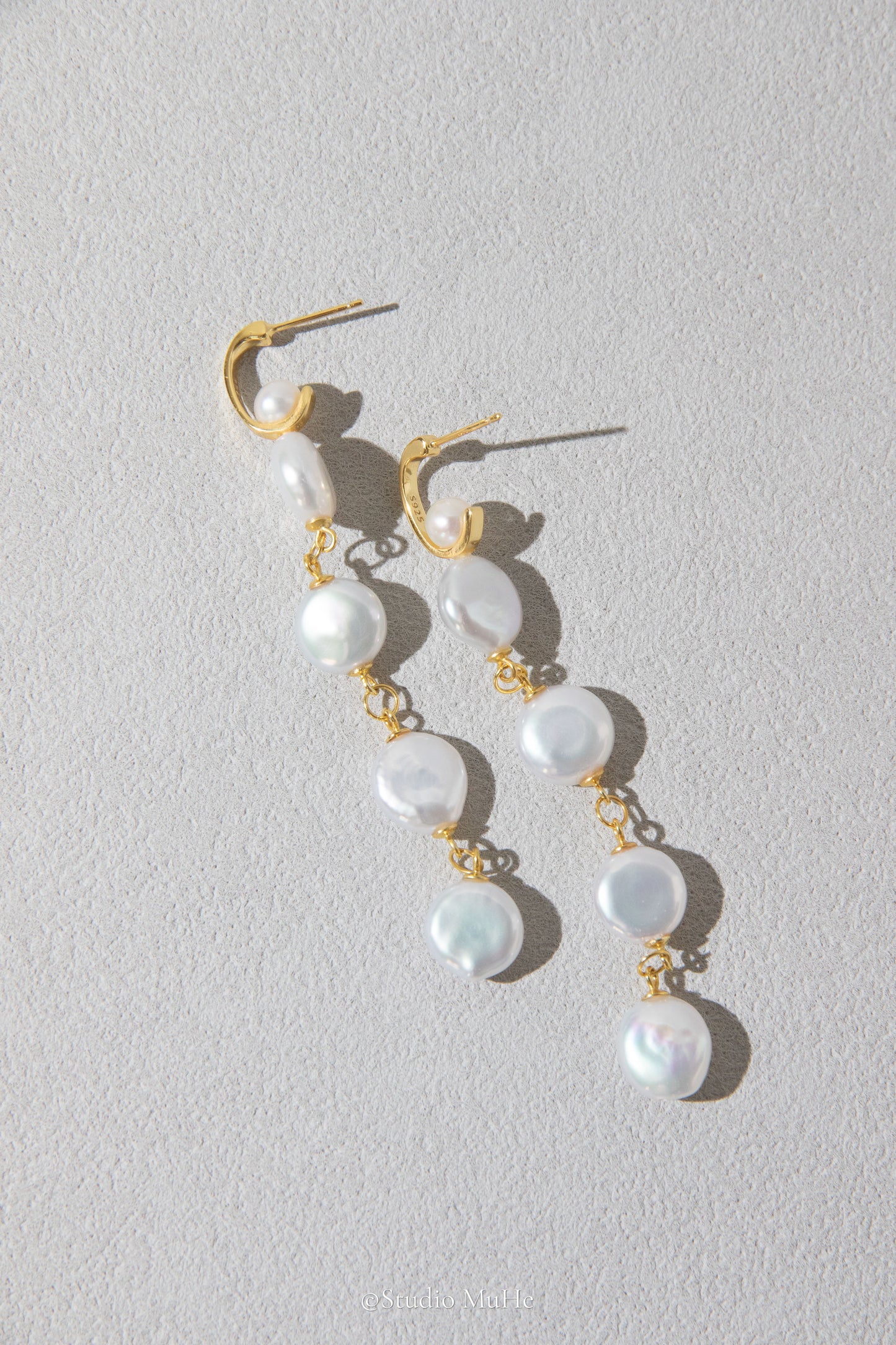 White button pearl earrings