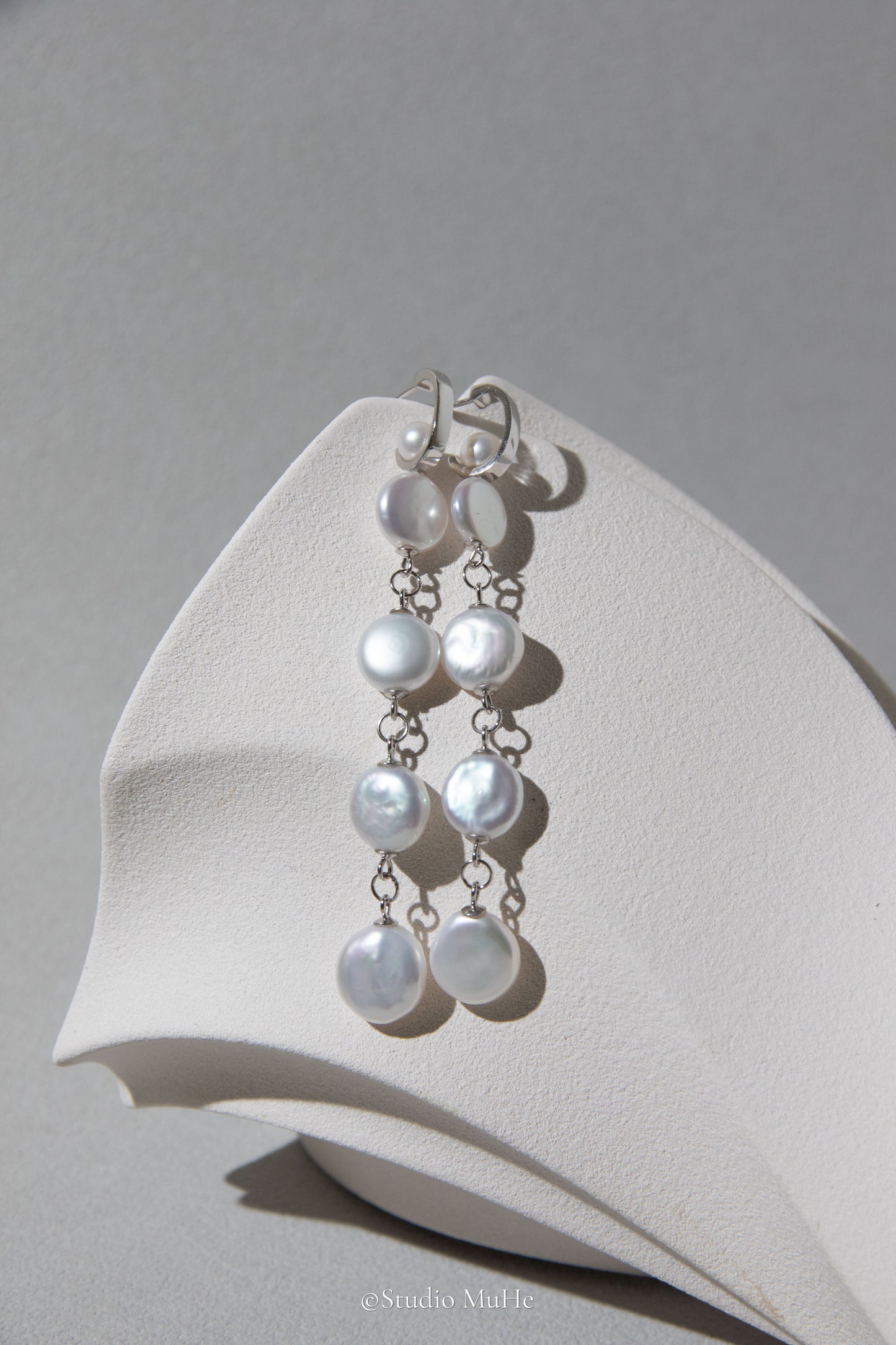 White button pearl earrings
