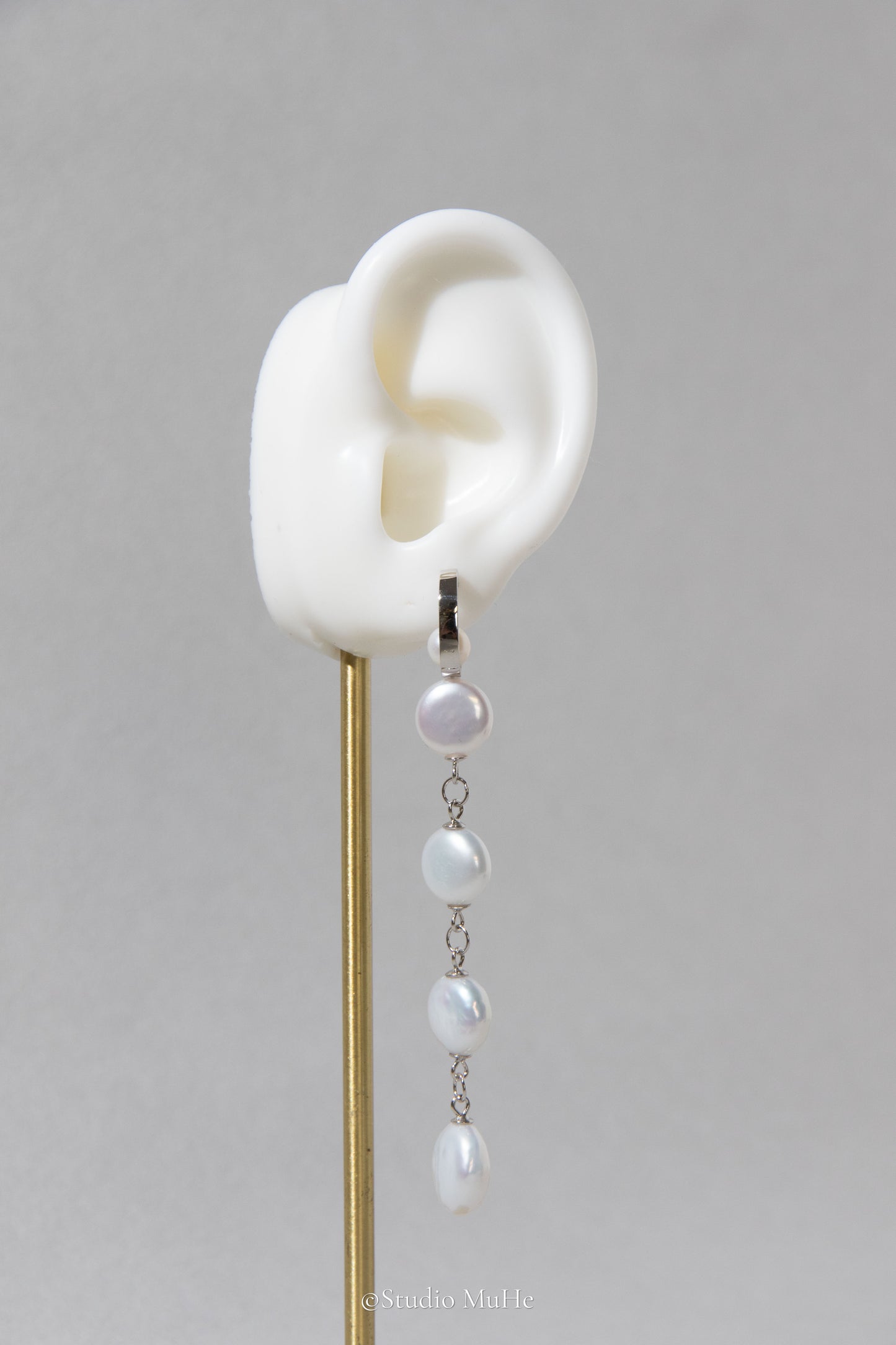 White button pearl earrings