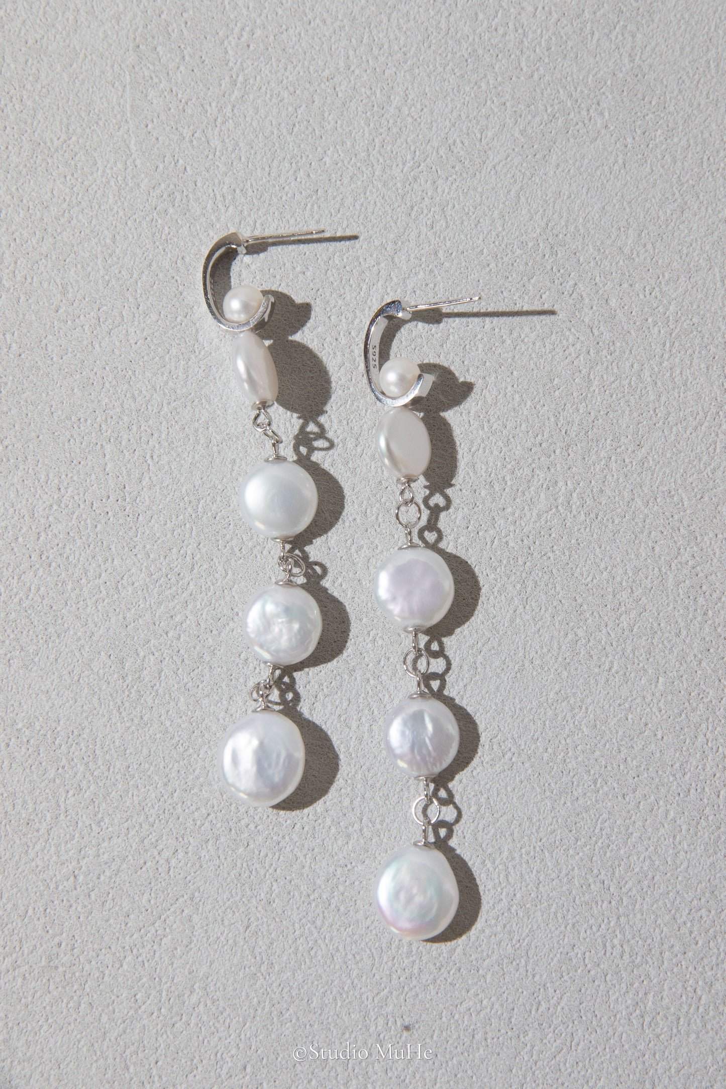 White button pearl earrings