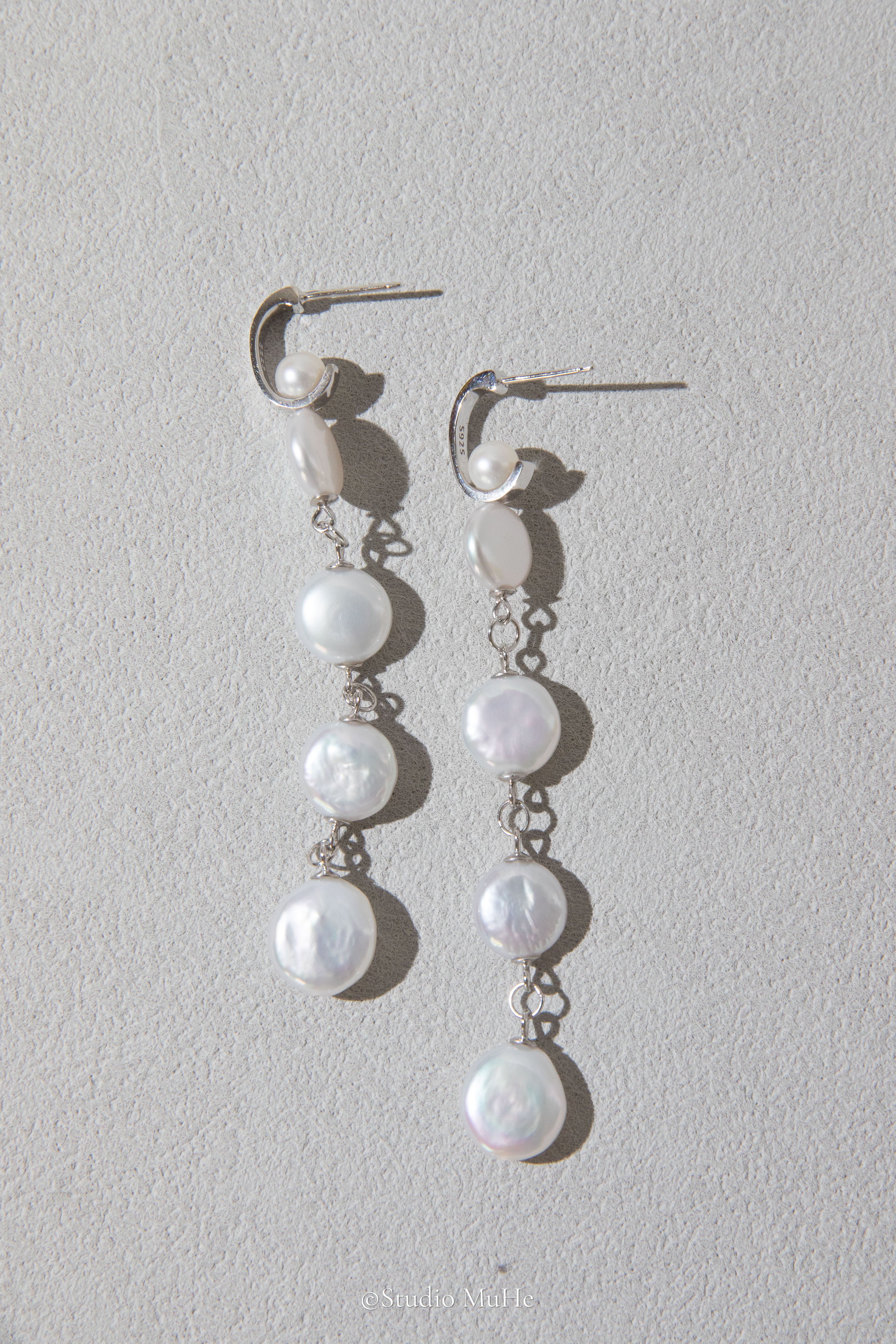 White button pearl earrings
