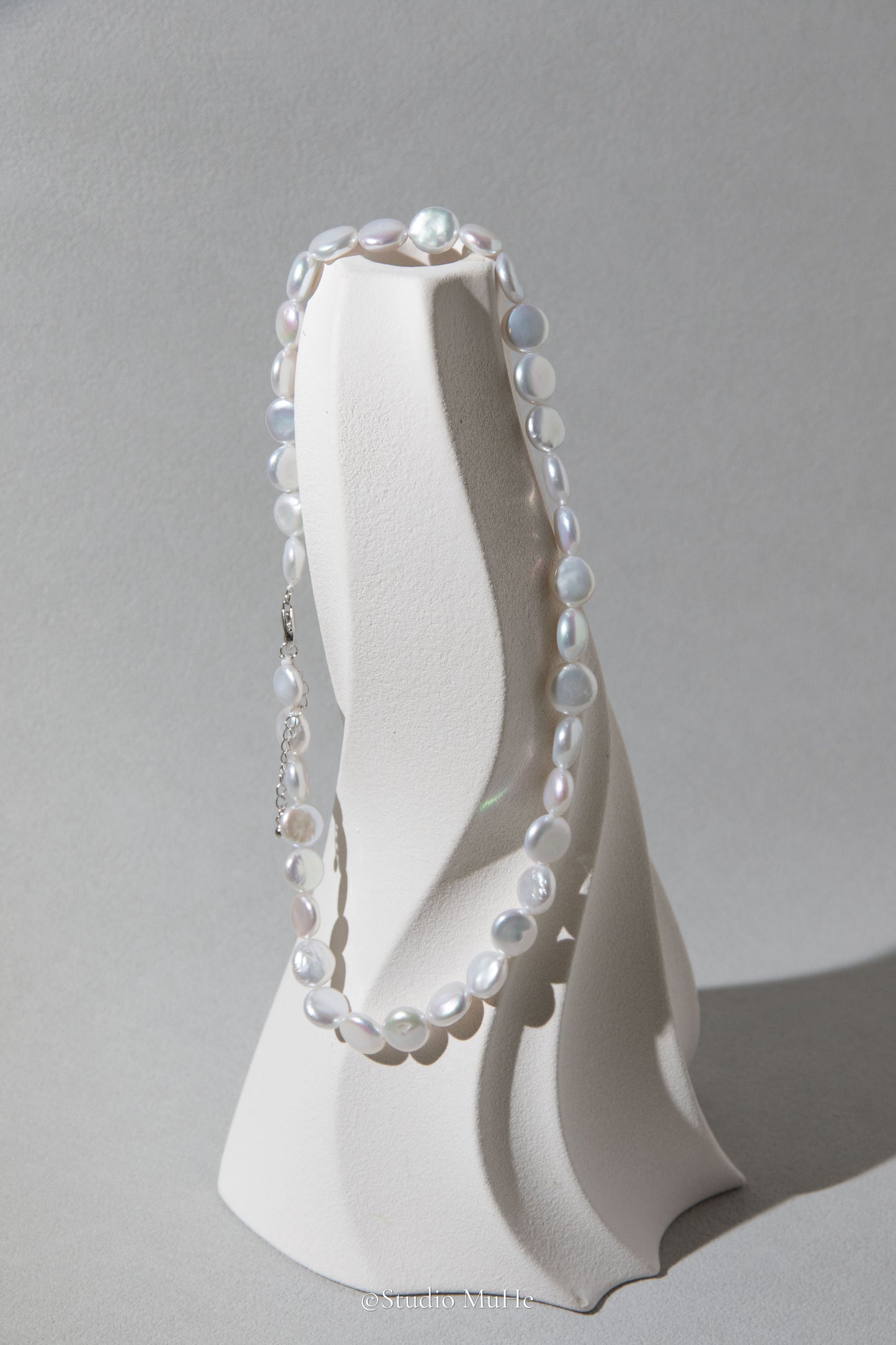 Button pearl necklace