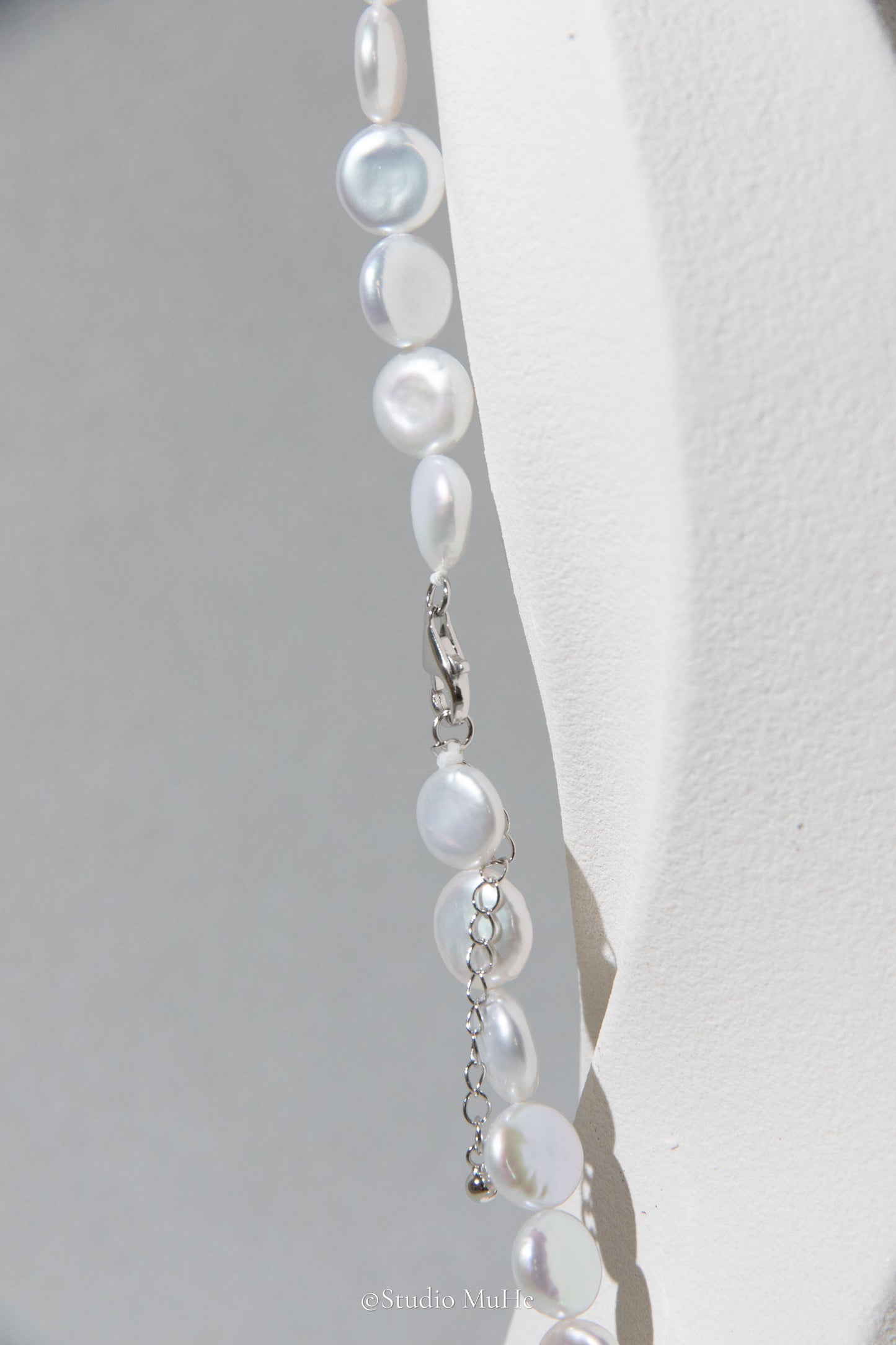 Button pearl necklace