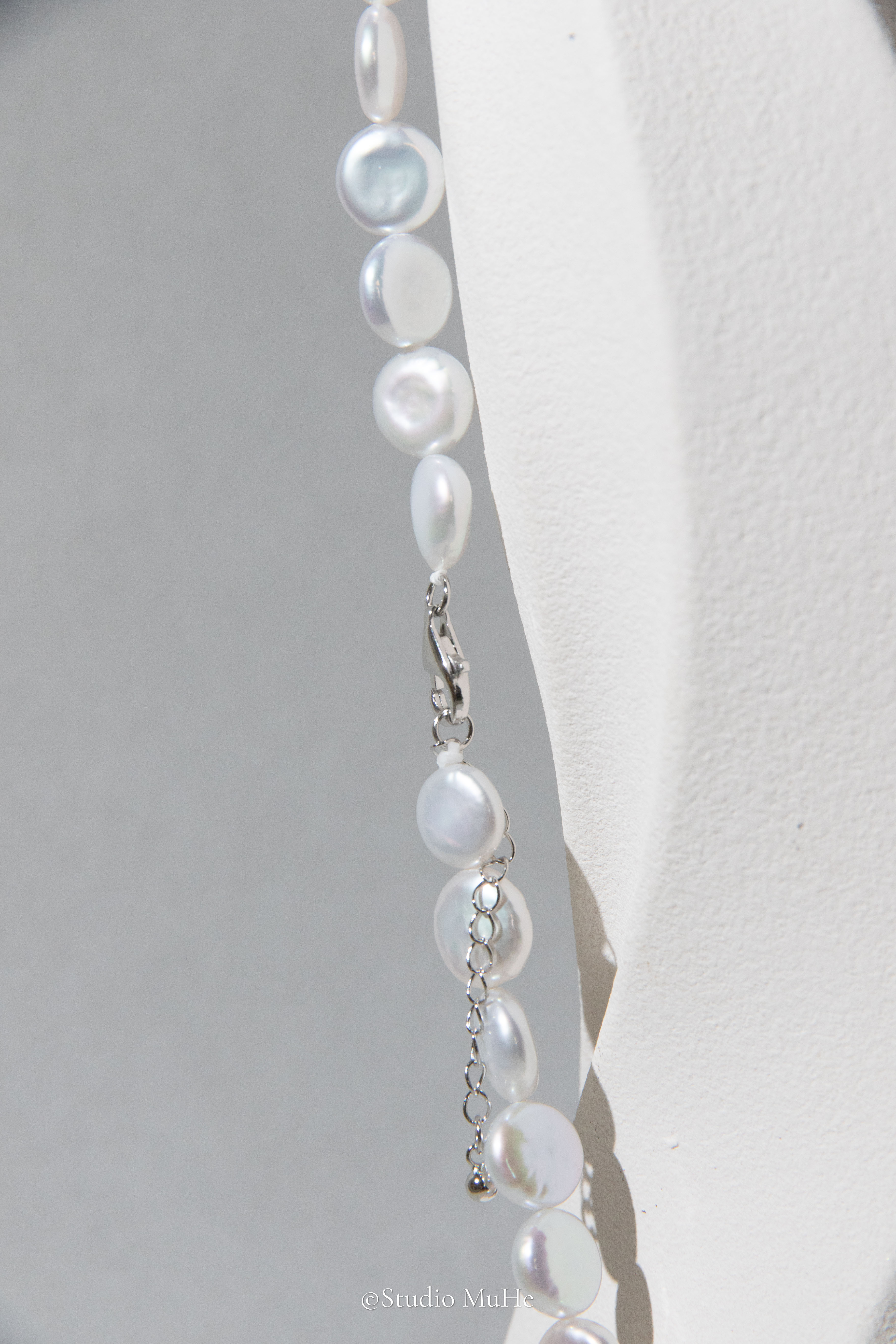 Button pearl necklace