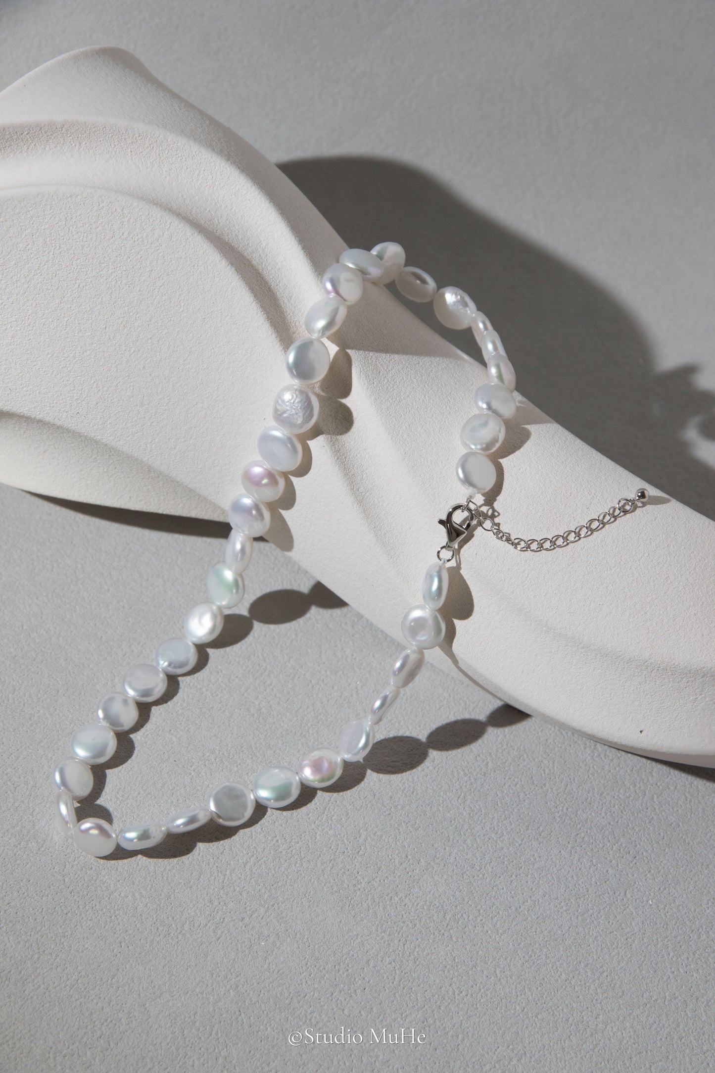Button pearl necklace