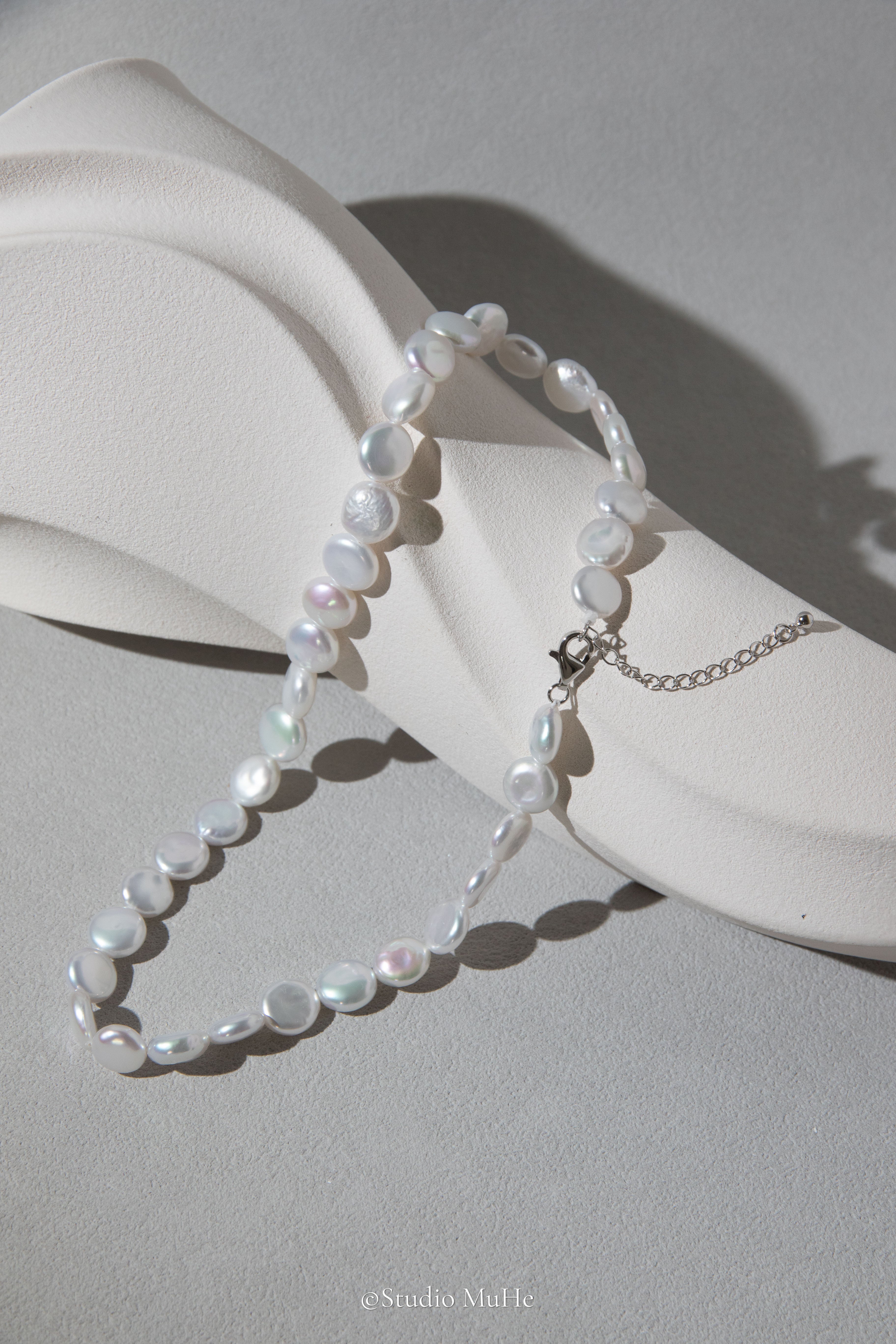 Button pearl necklace