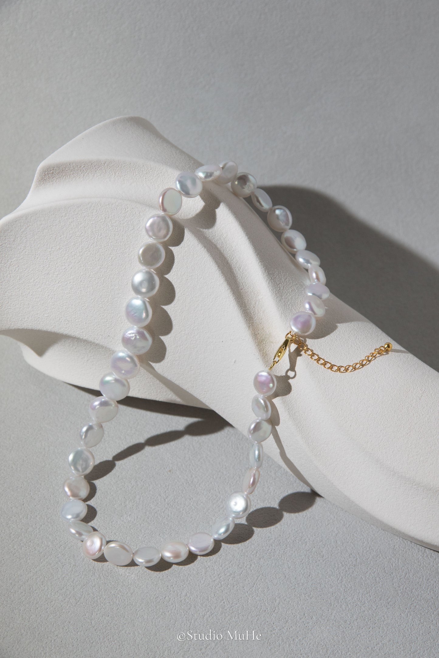 Button pearl necklace