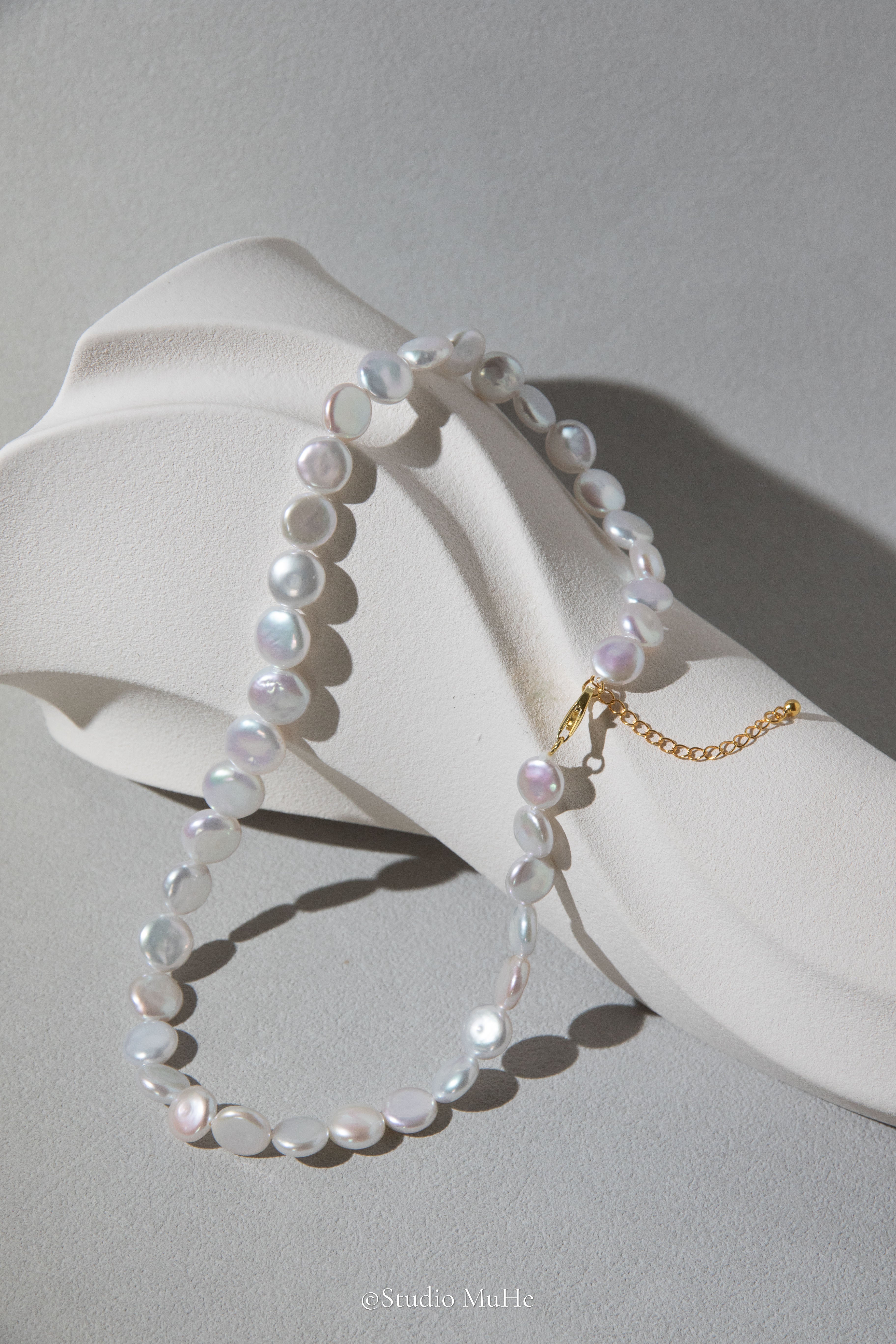Button pearl necklace