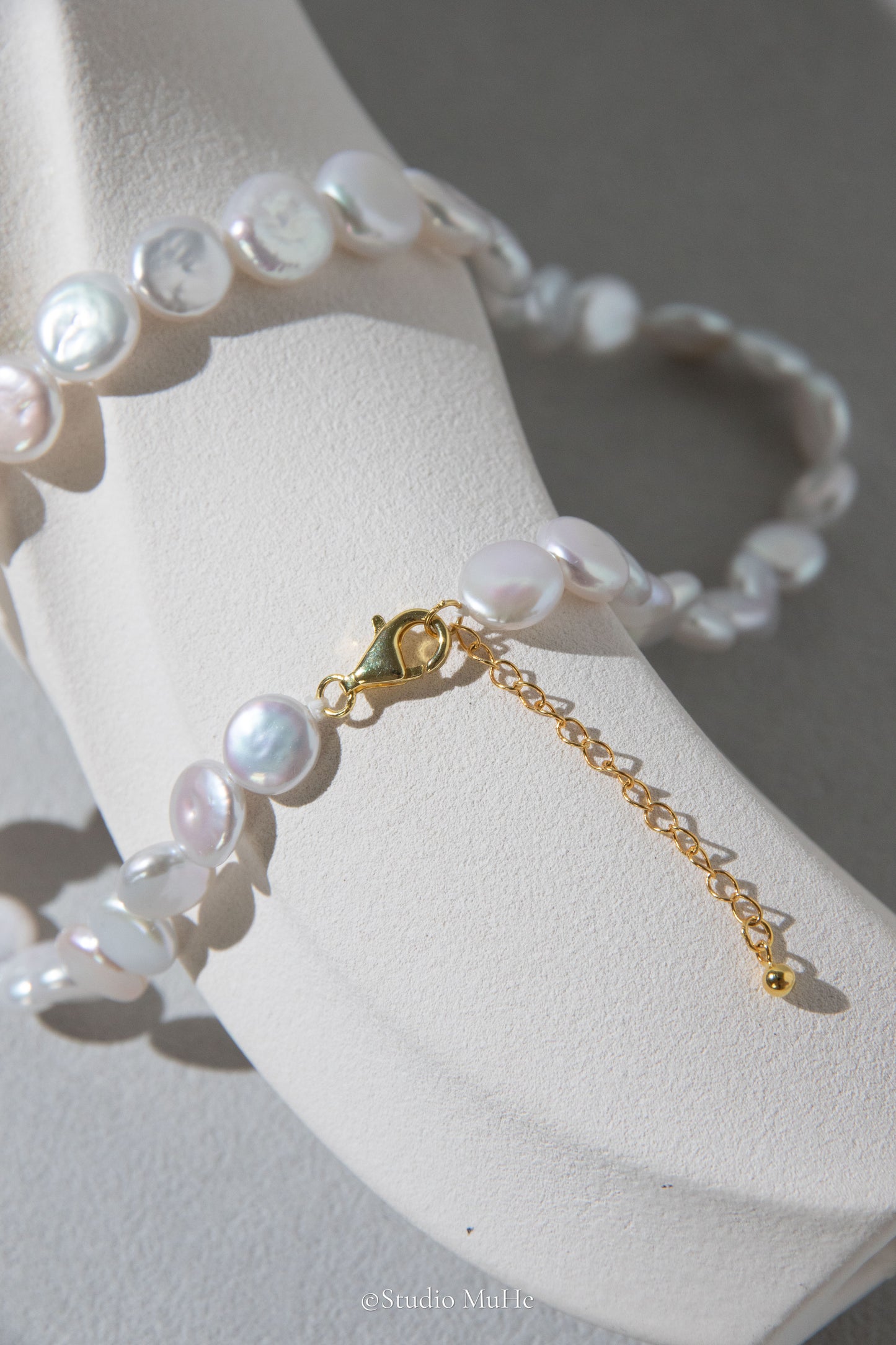 Button pearl necklace