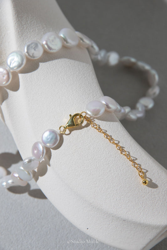 Button pearl necklace