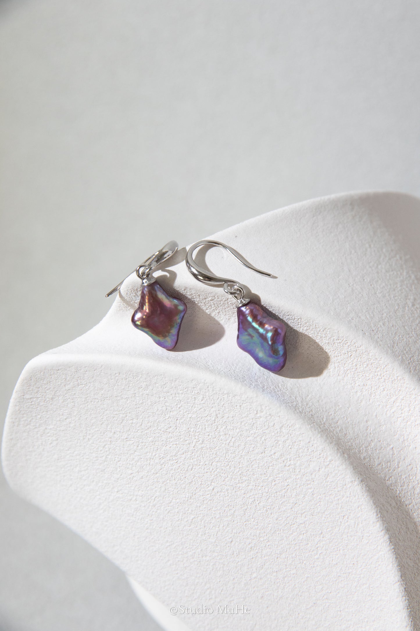 Dancing polar star earrings
