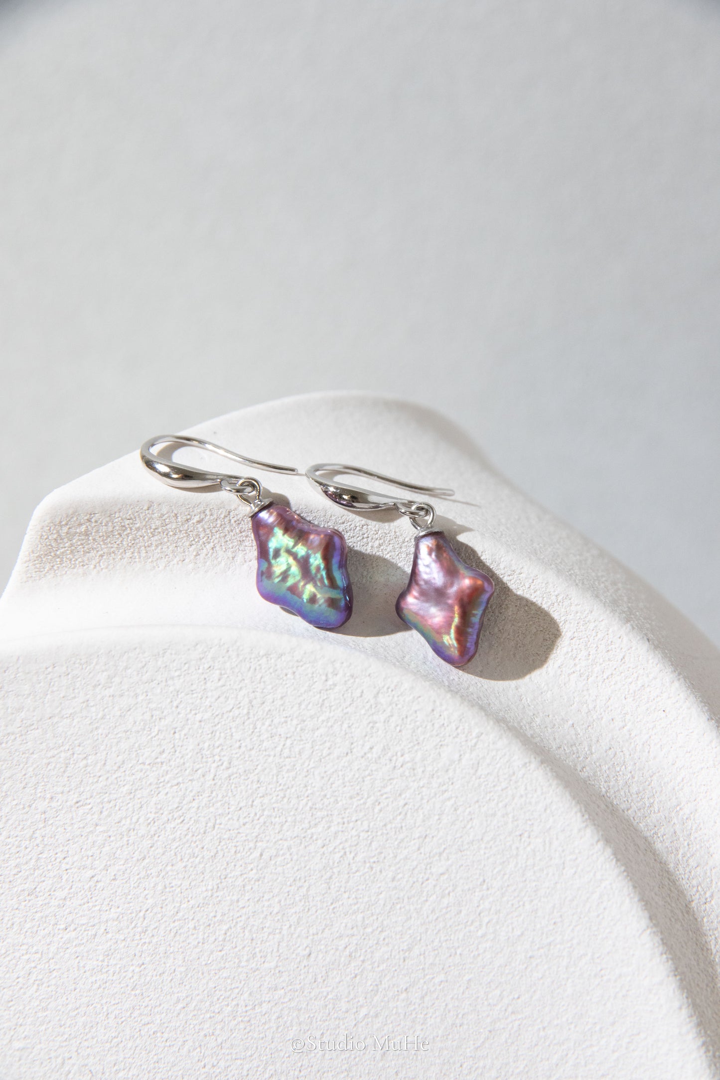 Dancing polar star earrings