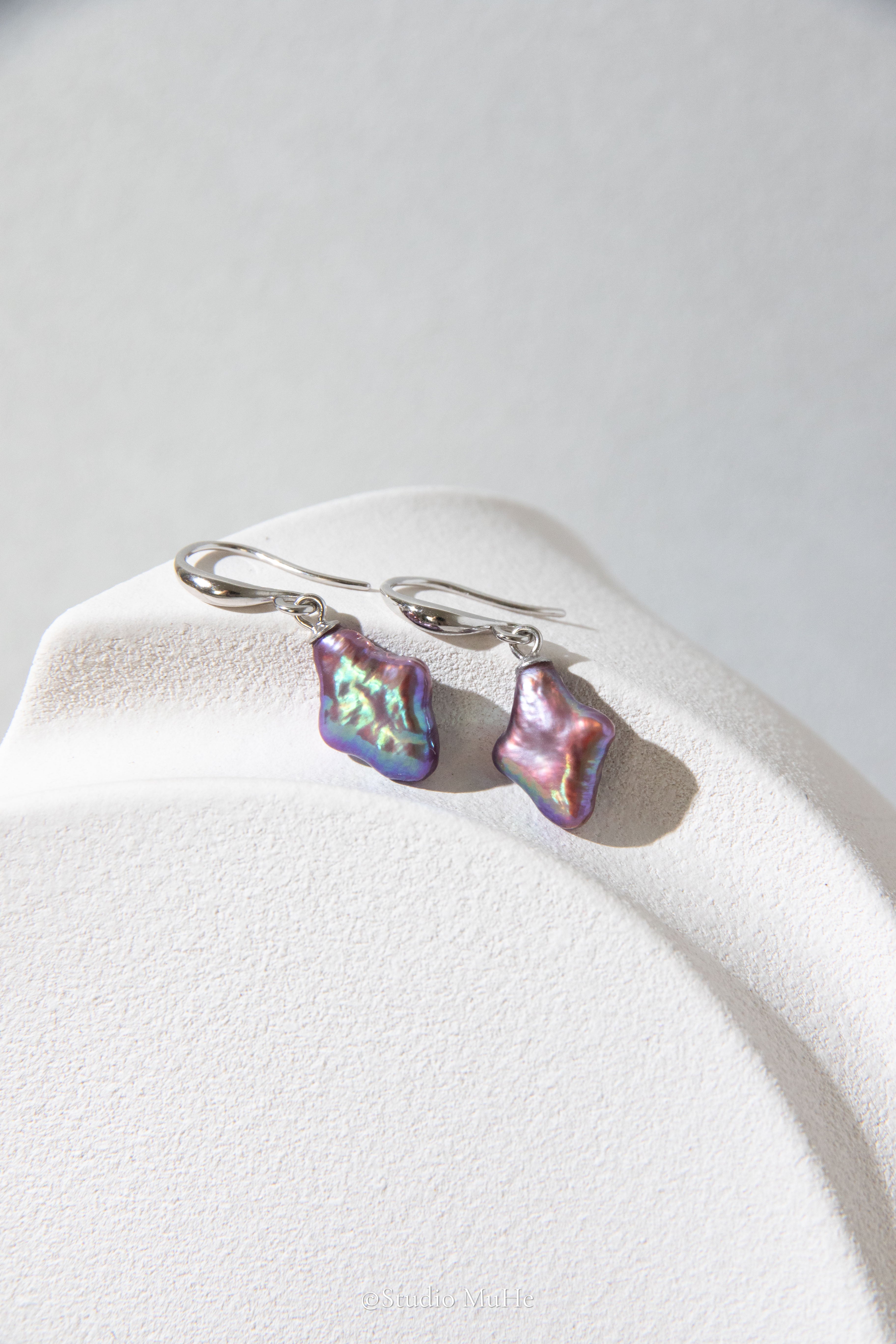 Dancing polar star earrings