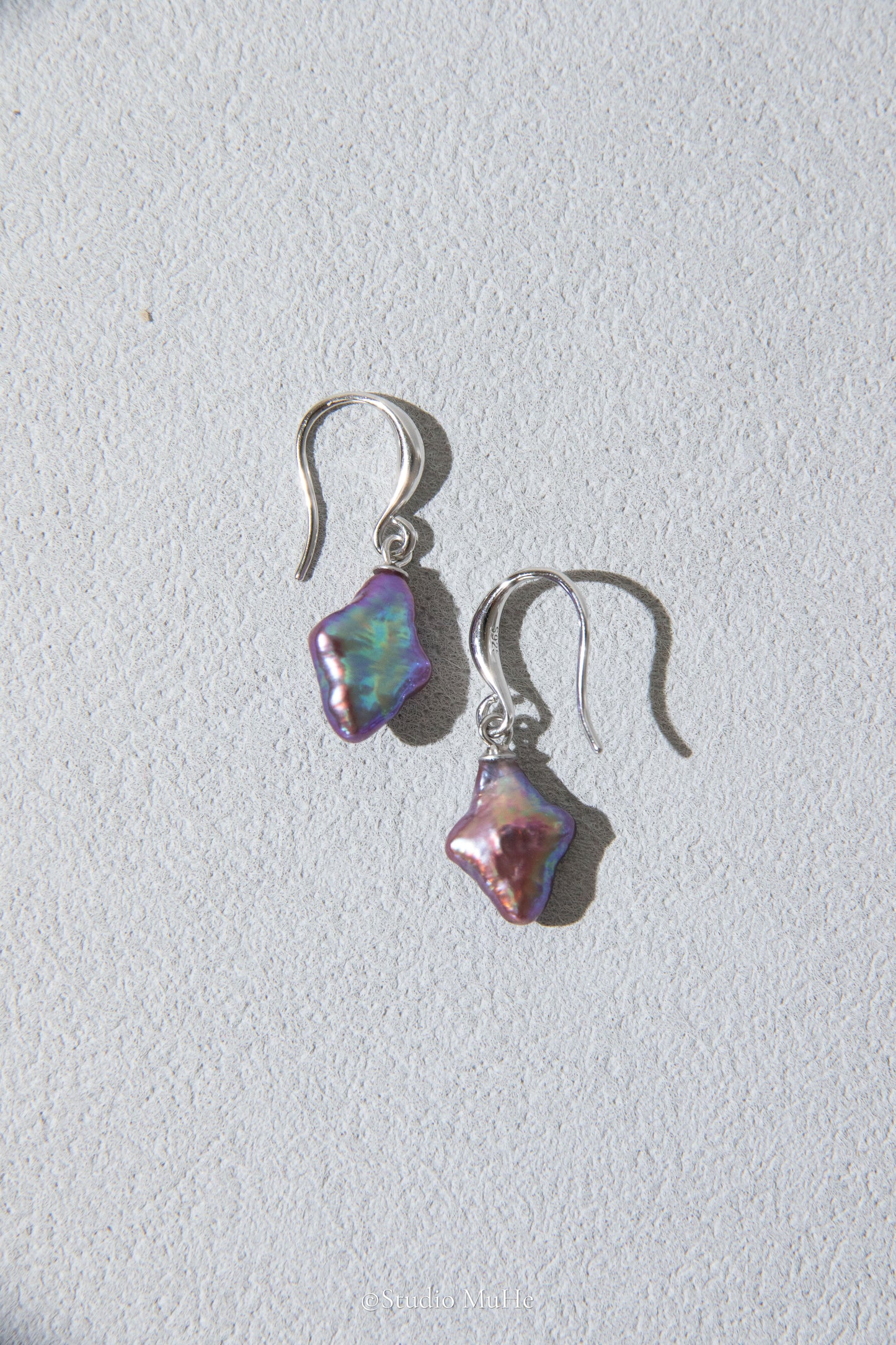 Dancing polar star earrings