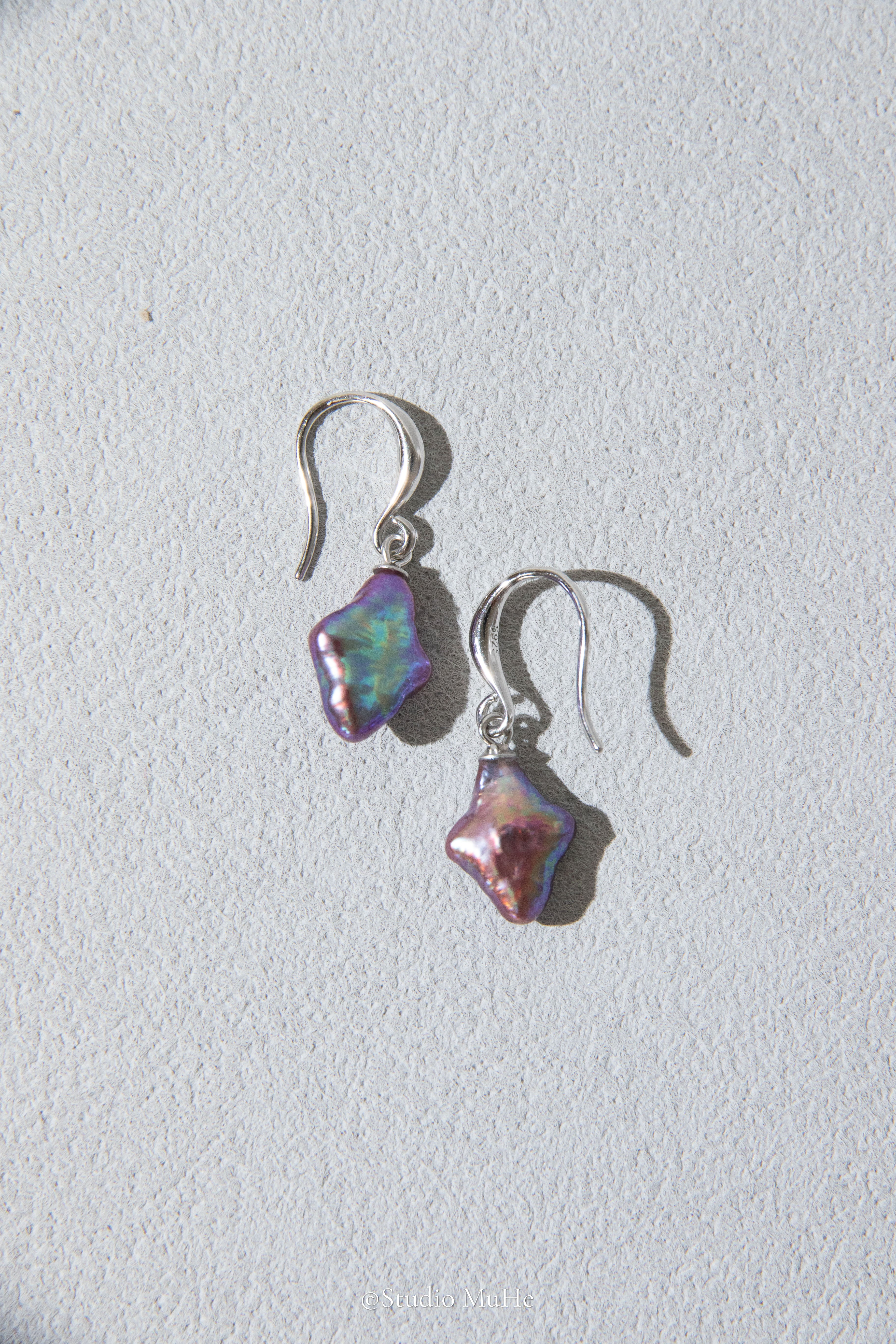 Dancing polar star earrings