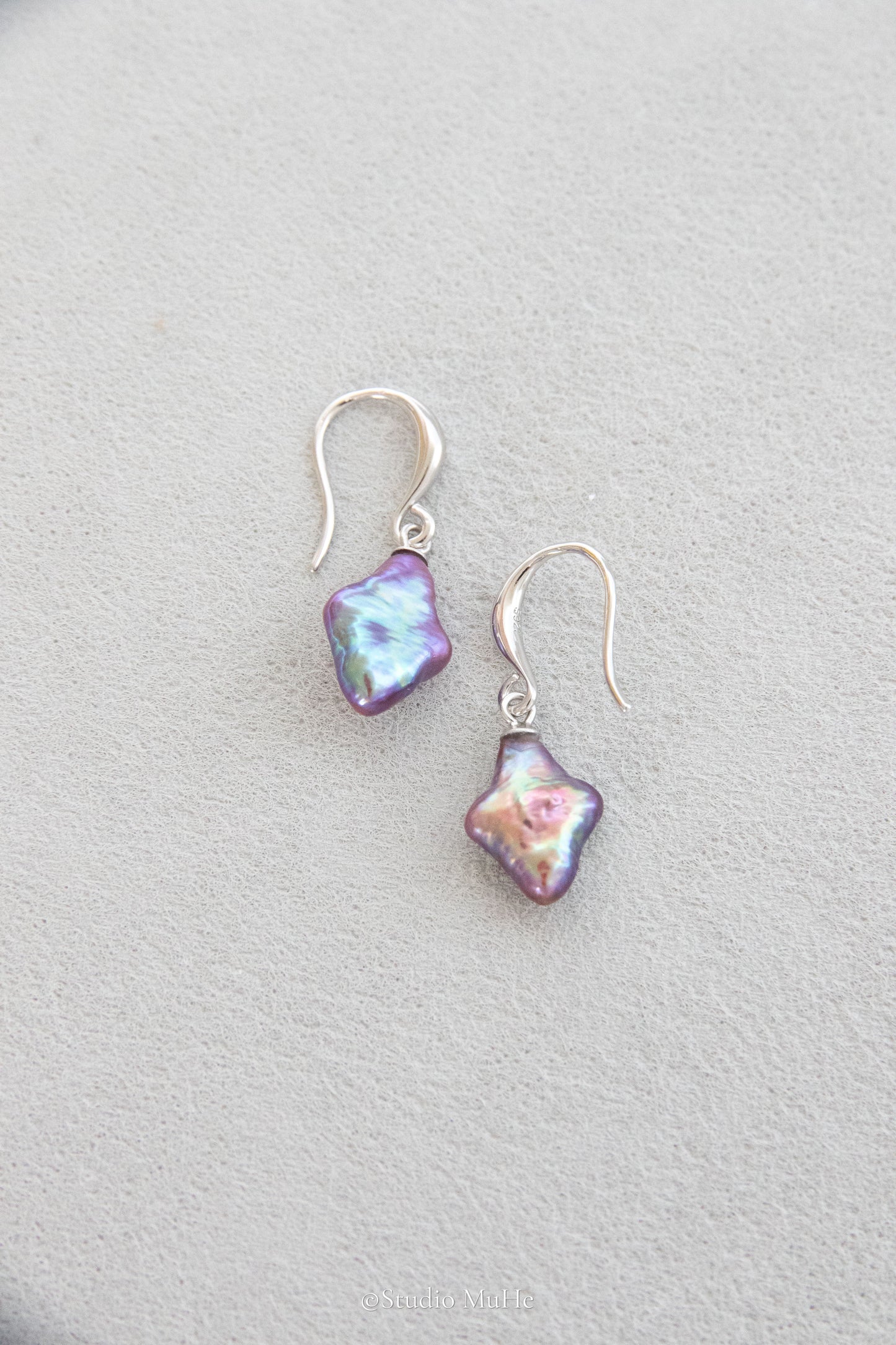 Dancing polar star earrings