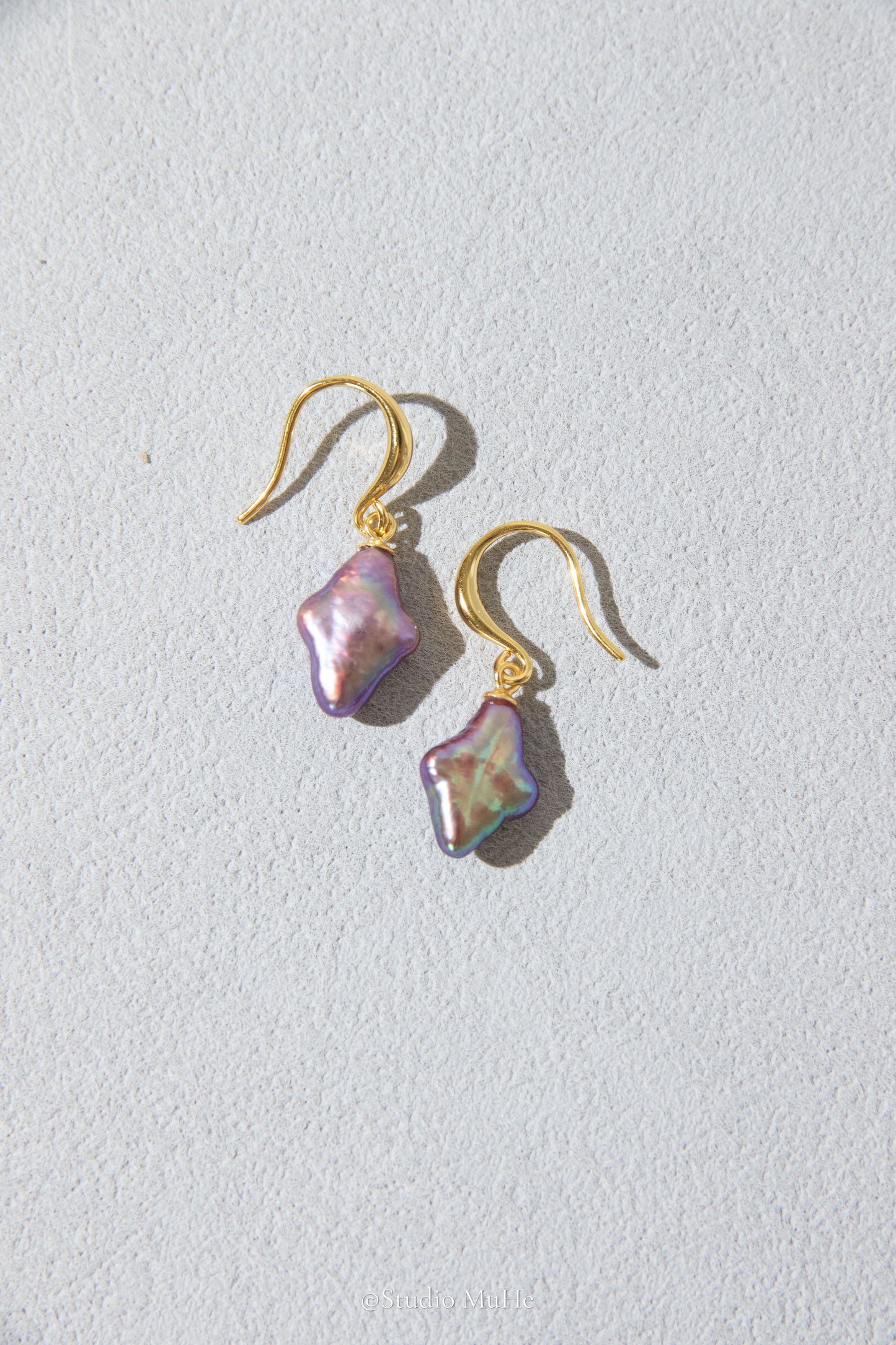Dancing polar star earrings