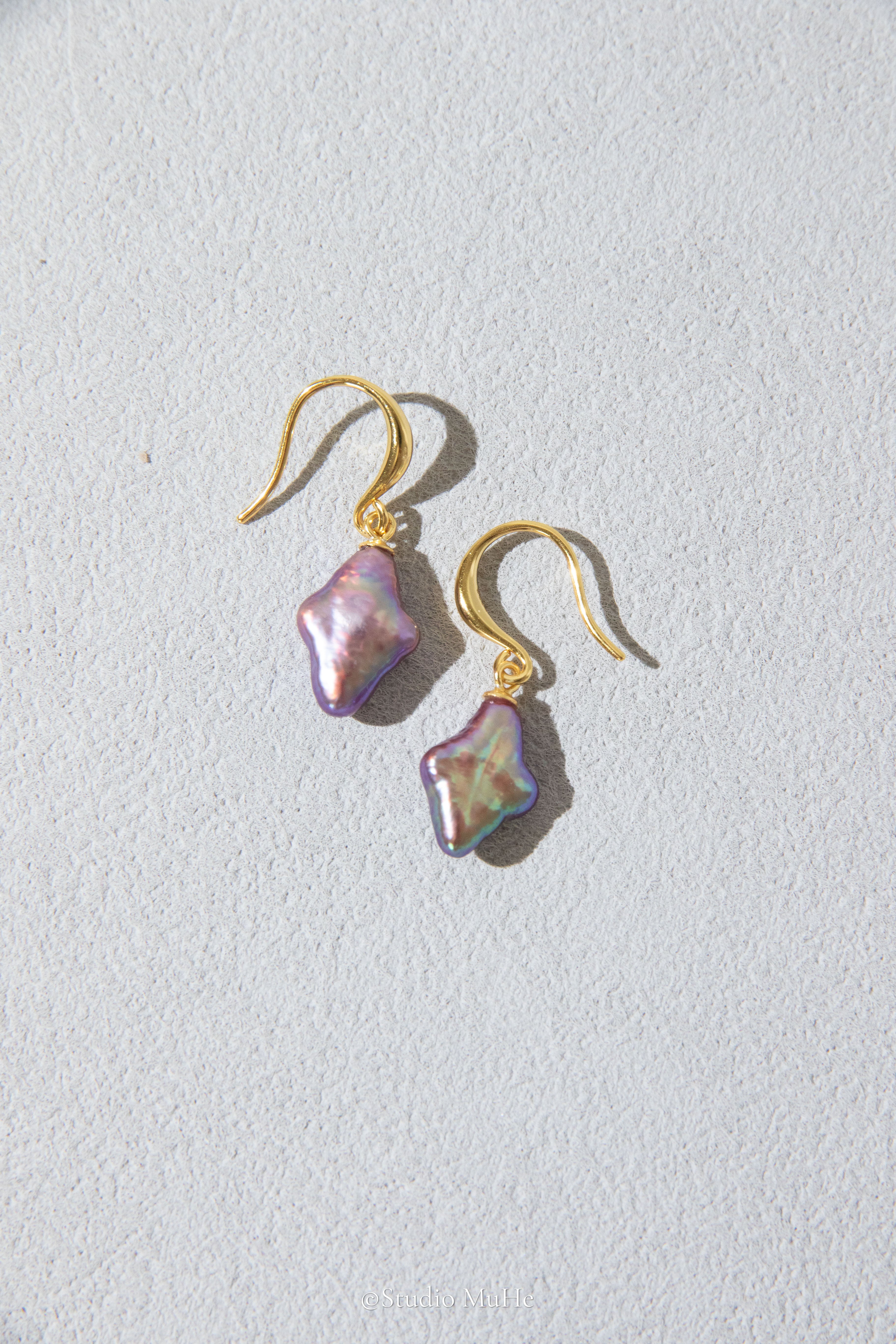 Dancing polar star earrings