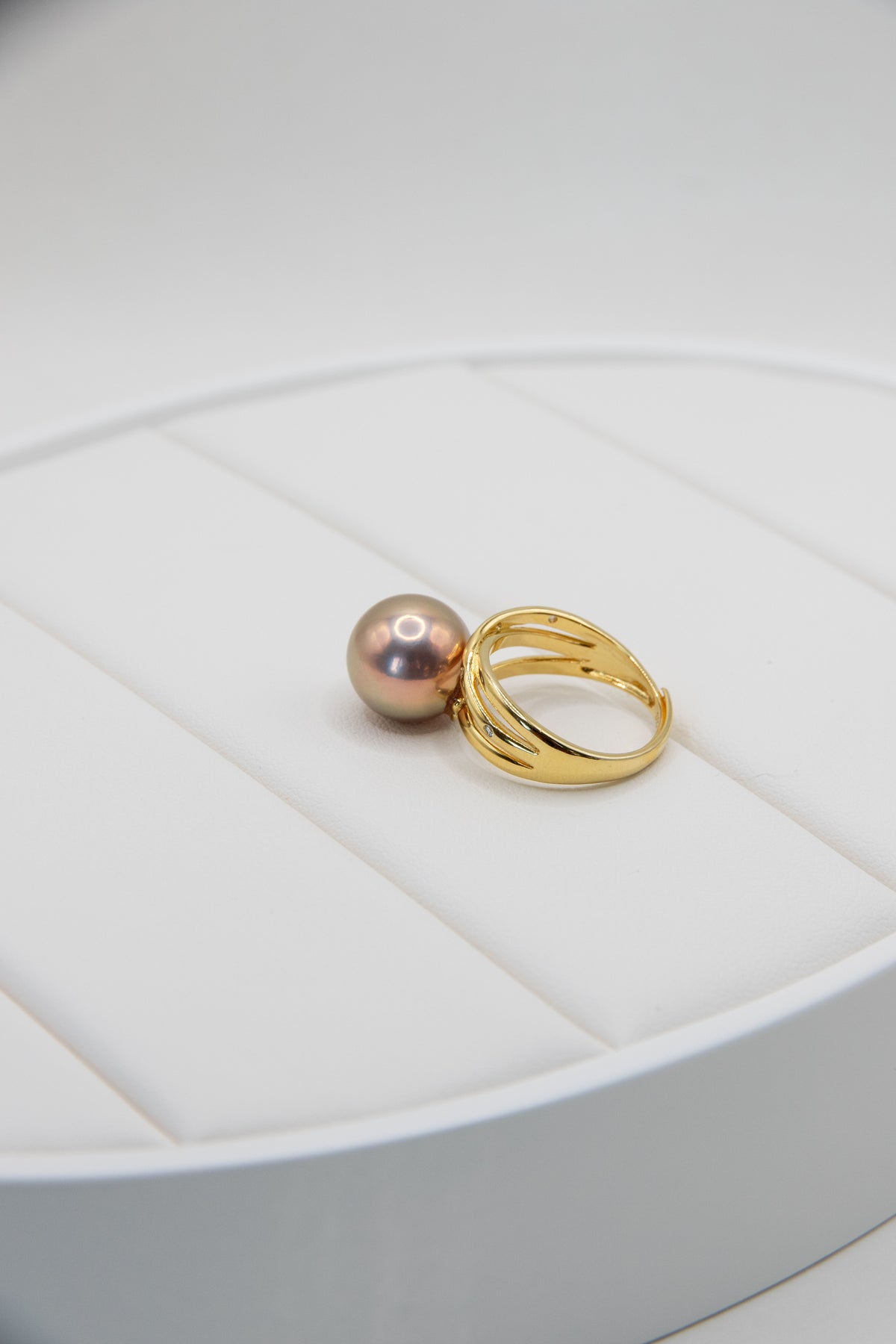 Excellent golden green big pearl