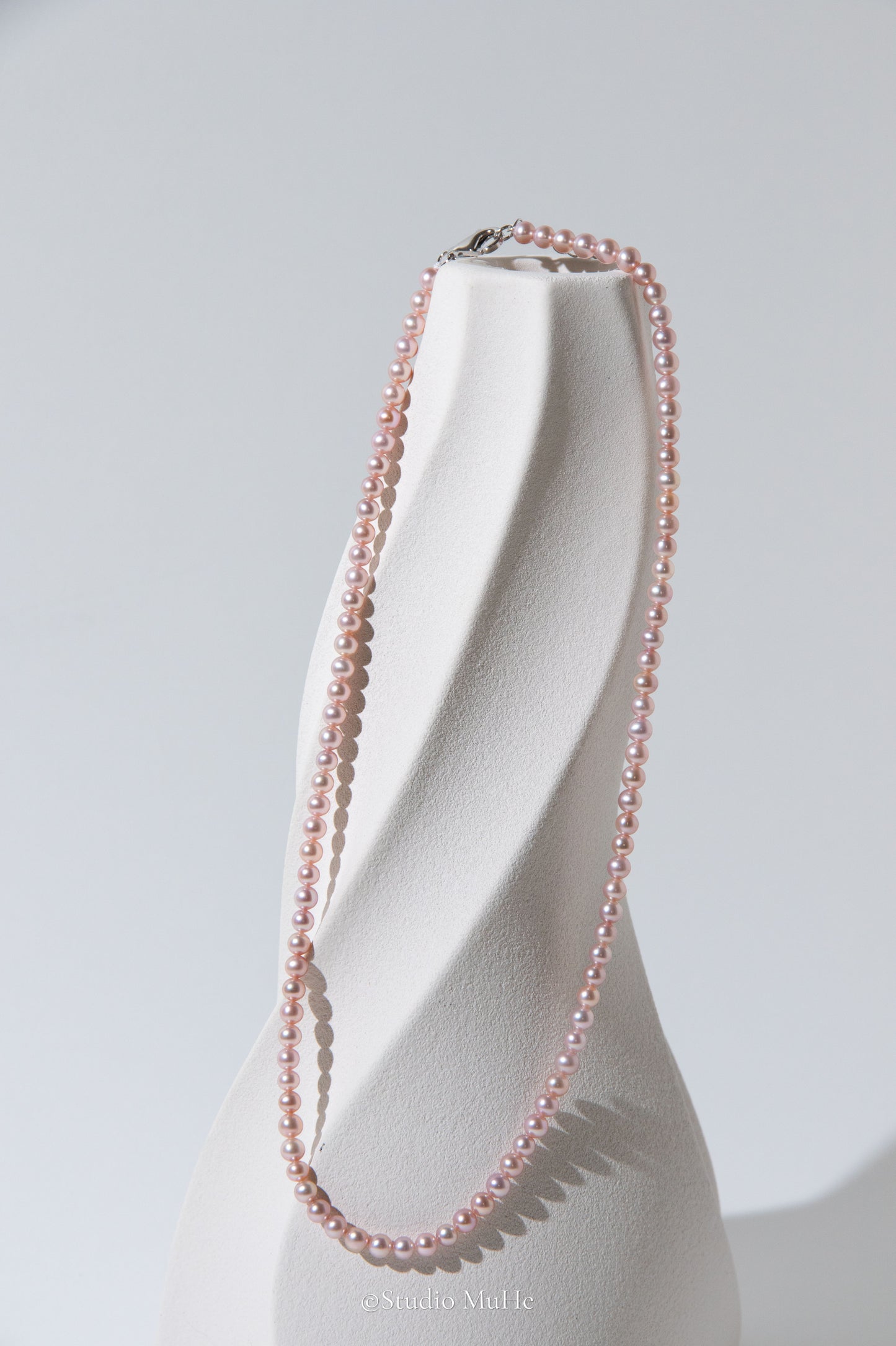 Summer Peach-Excellent level light peach colored flawless small round seedless pearls necklace