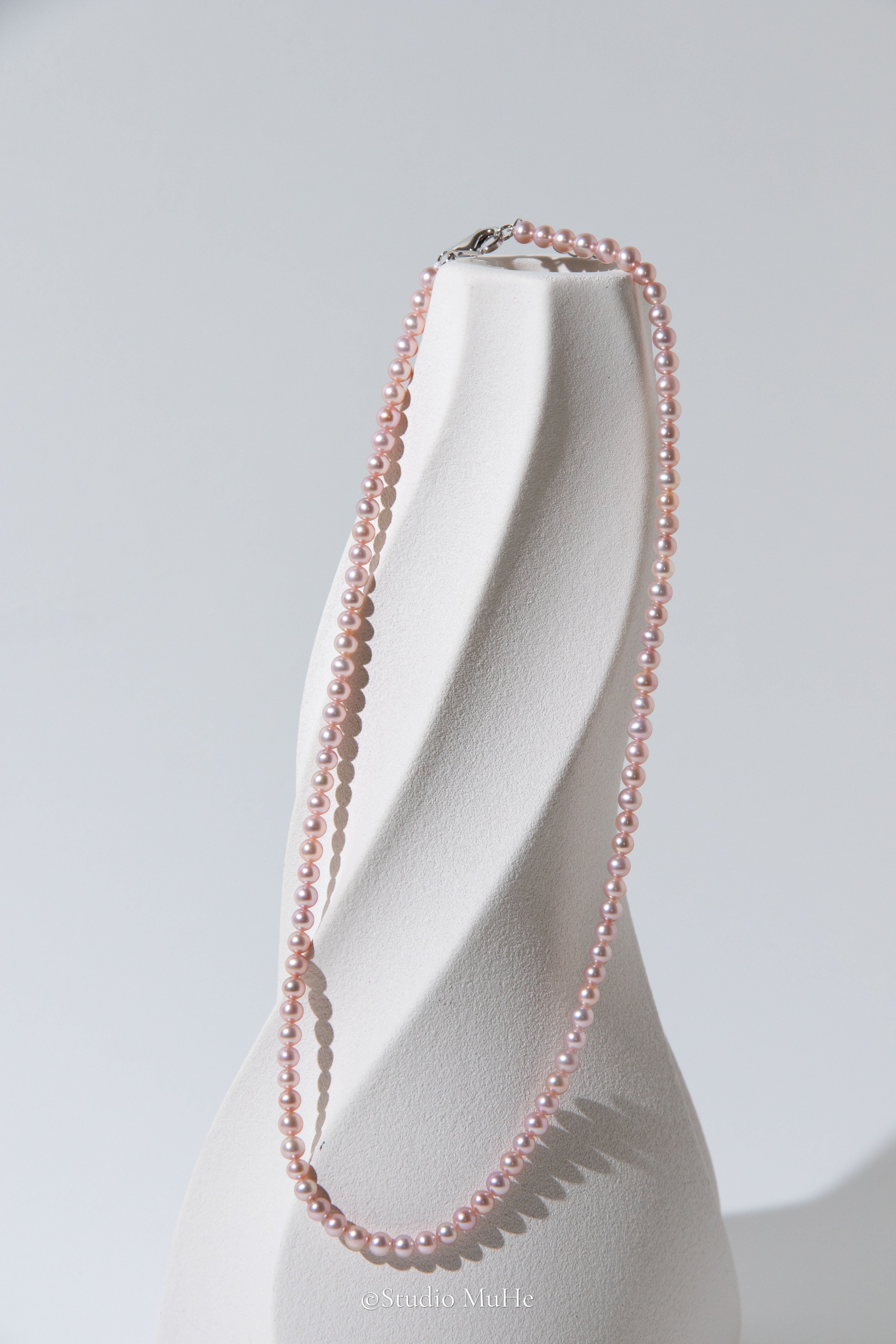 Summer Peach-Excellent level light peach colored flawless small round seedless pearls necklace