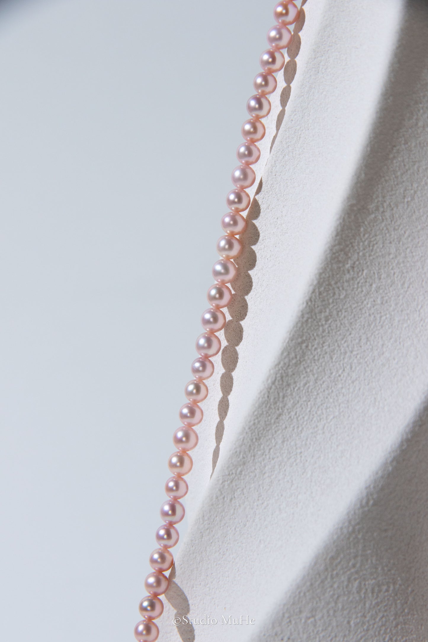 Summer Peach-Excellent level light peach colored flawless small round seedless pearls necklace