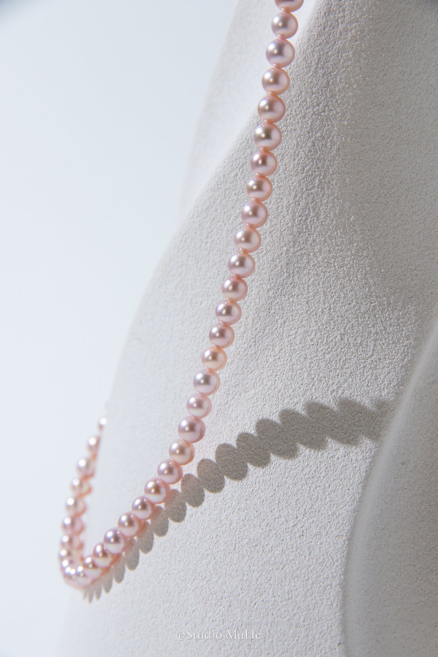 Summer Peach-Excellent level light peach colored flawless small round seedless pearls necklace